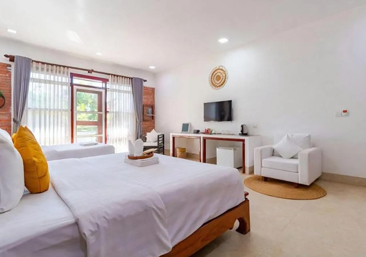 Bed in Angkor Eden Boutique Hotel