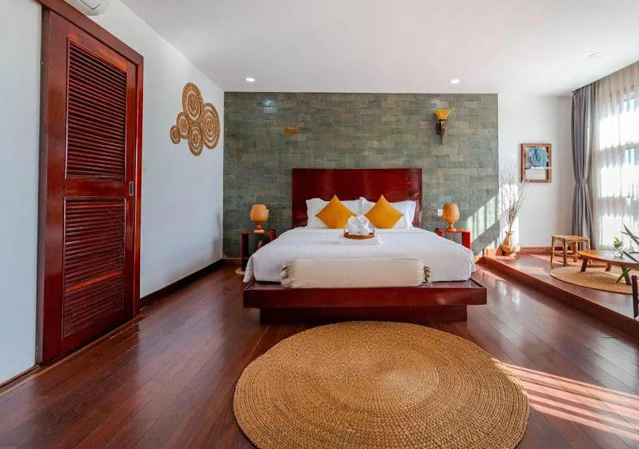 Bed in Angkor Eden Boutique Hotel