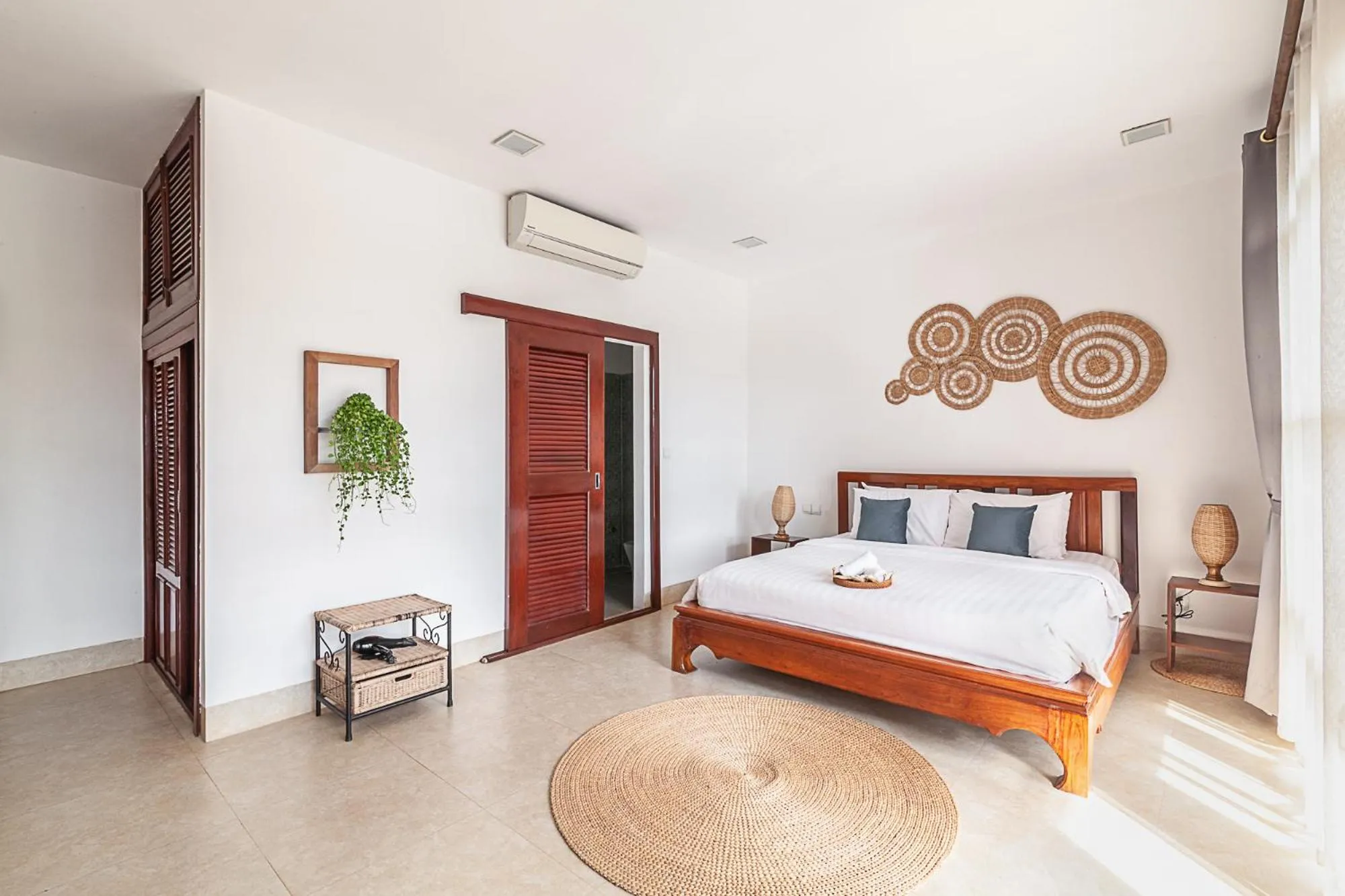 Bed in Angkor Eden Boutique Hotel