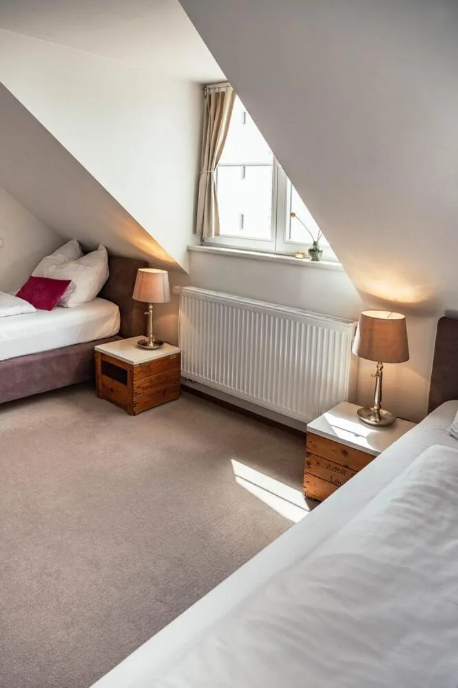 Bed in Allgäuer Genusshotel und Historischer Dorfgasthof Hirsch