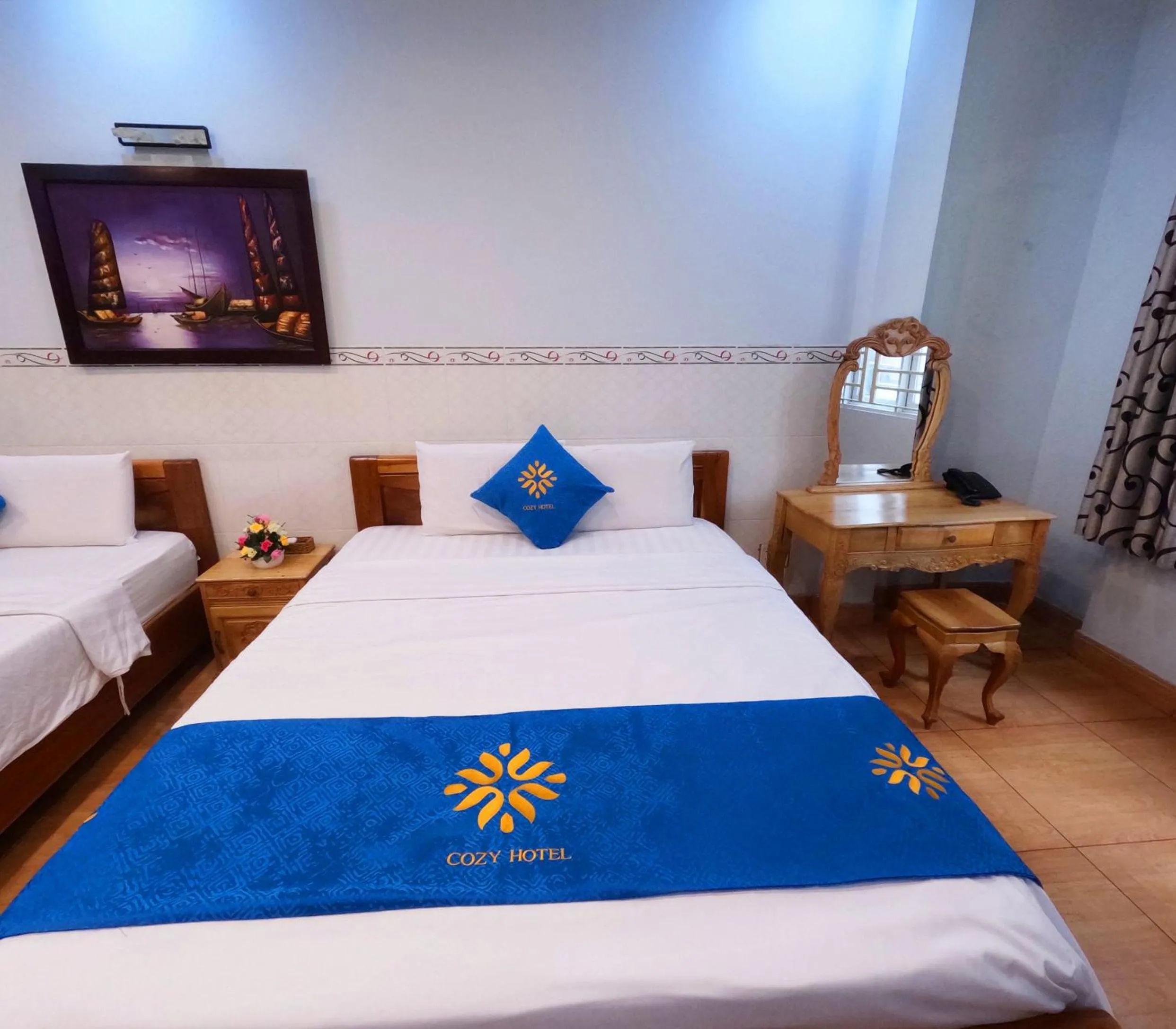 Bed in COZY Hotel HCM