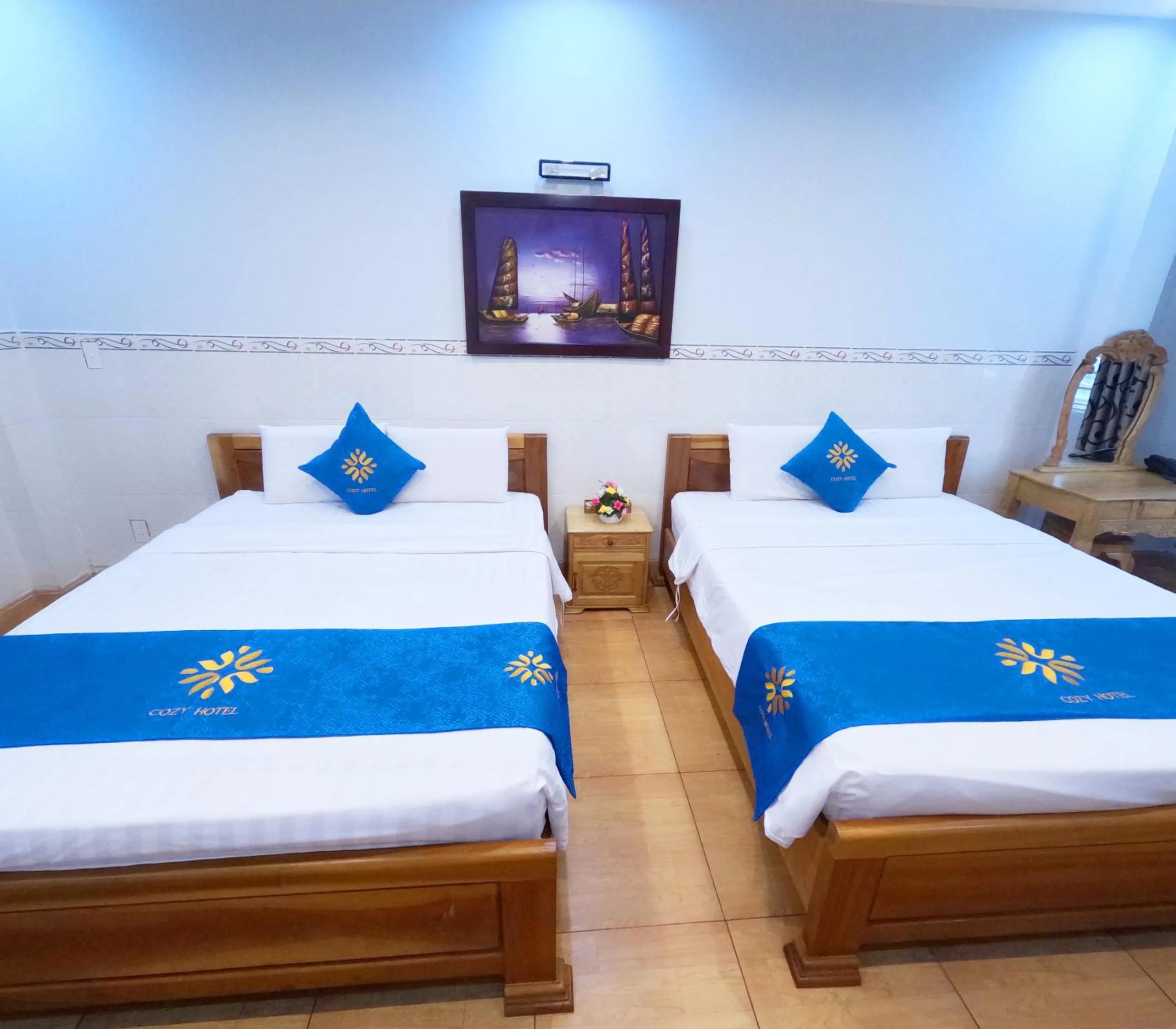 Bed in COZY Hotel HCM