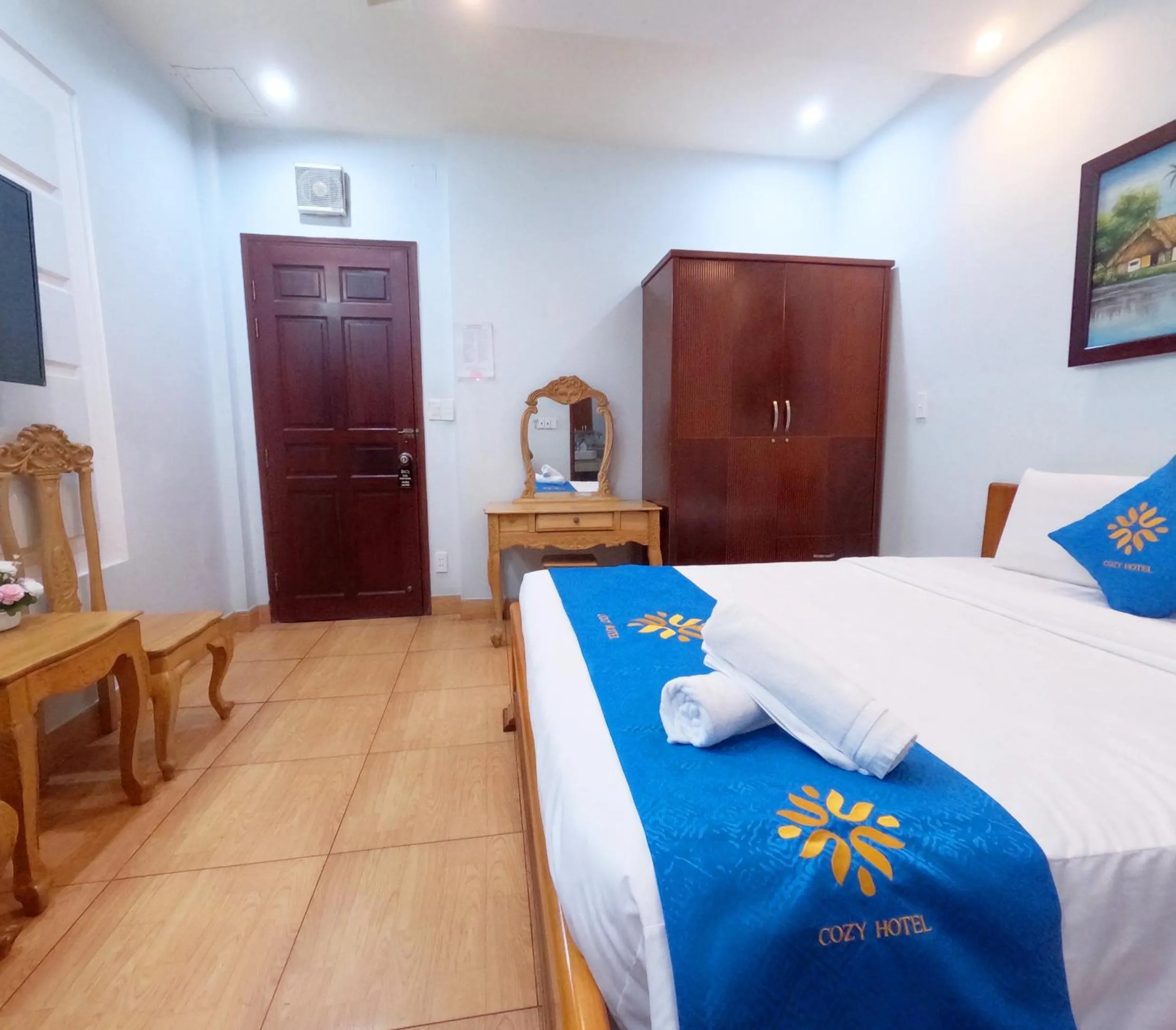 Bed in COZY Hotel HCM