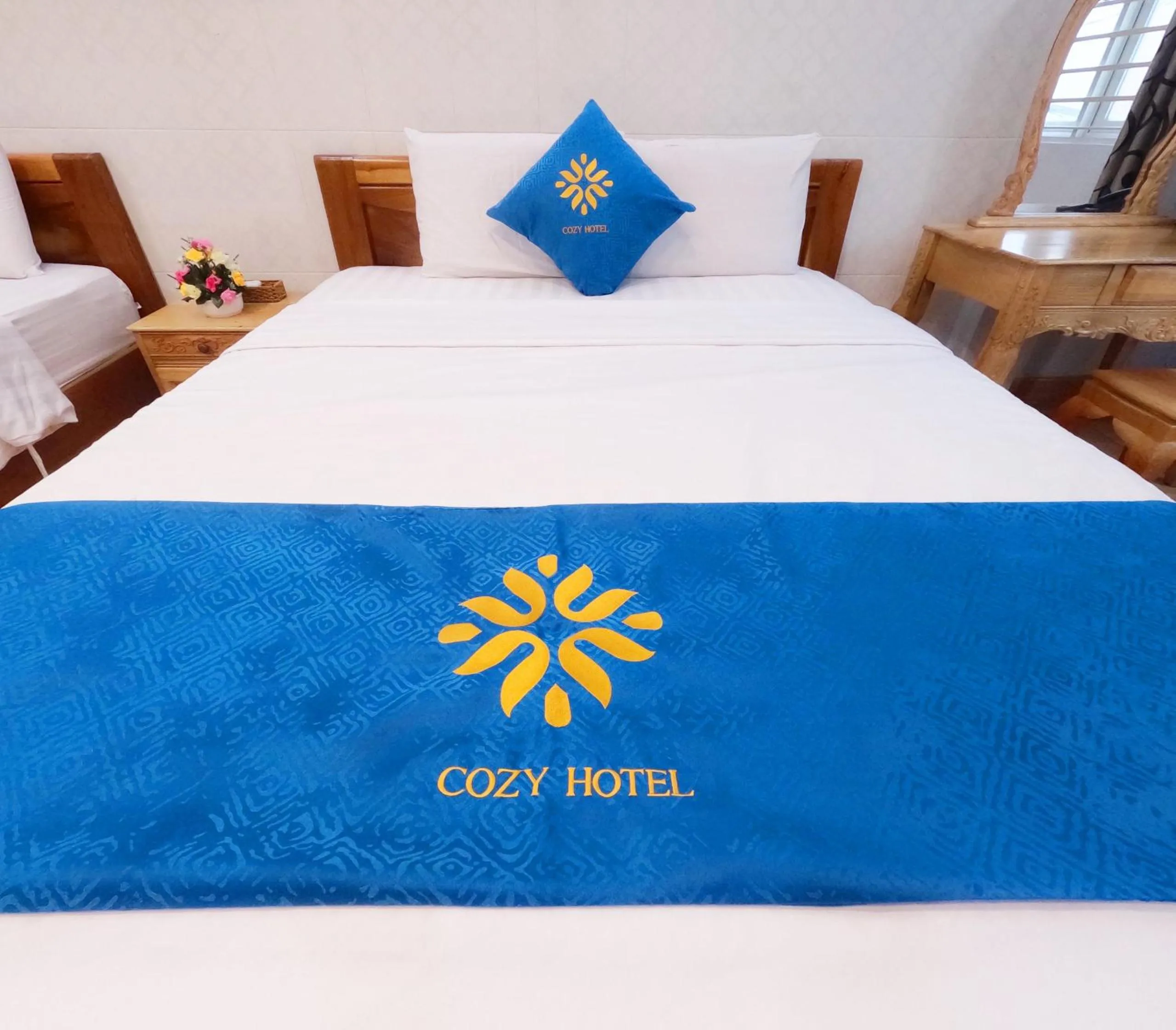 Bed in COZY Hotel HCM