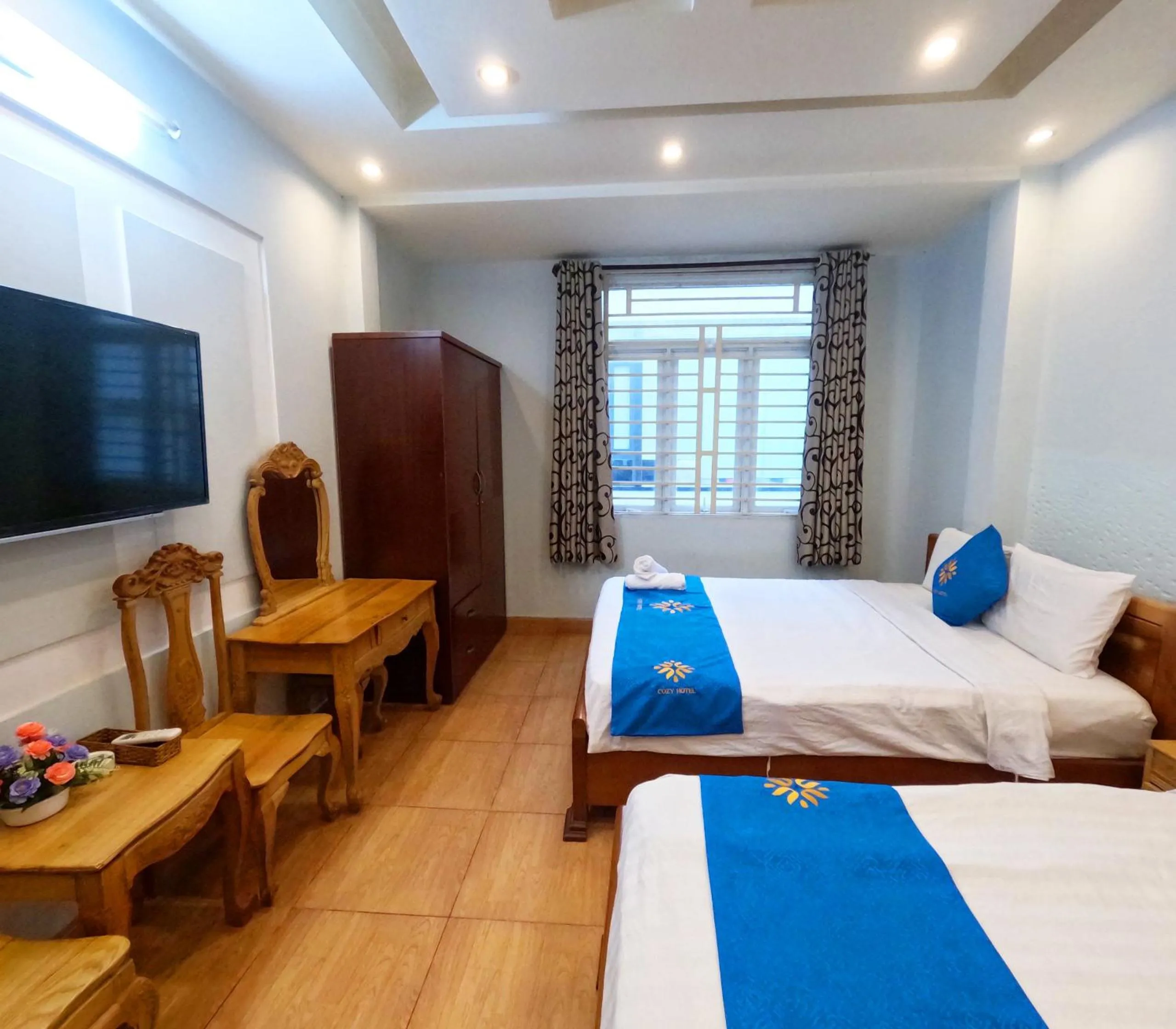 Bed in COZY Hotel HCM