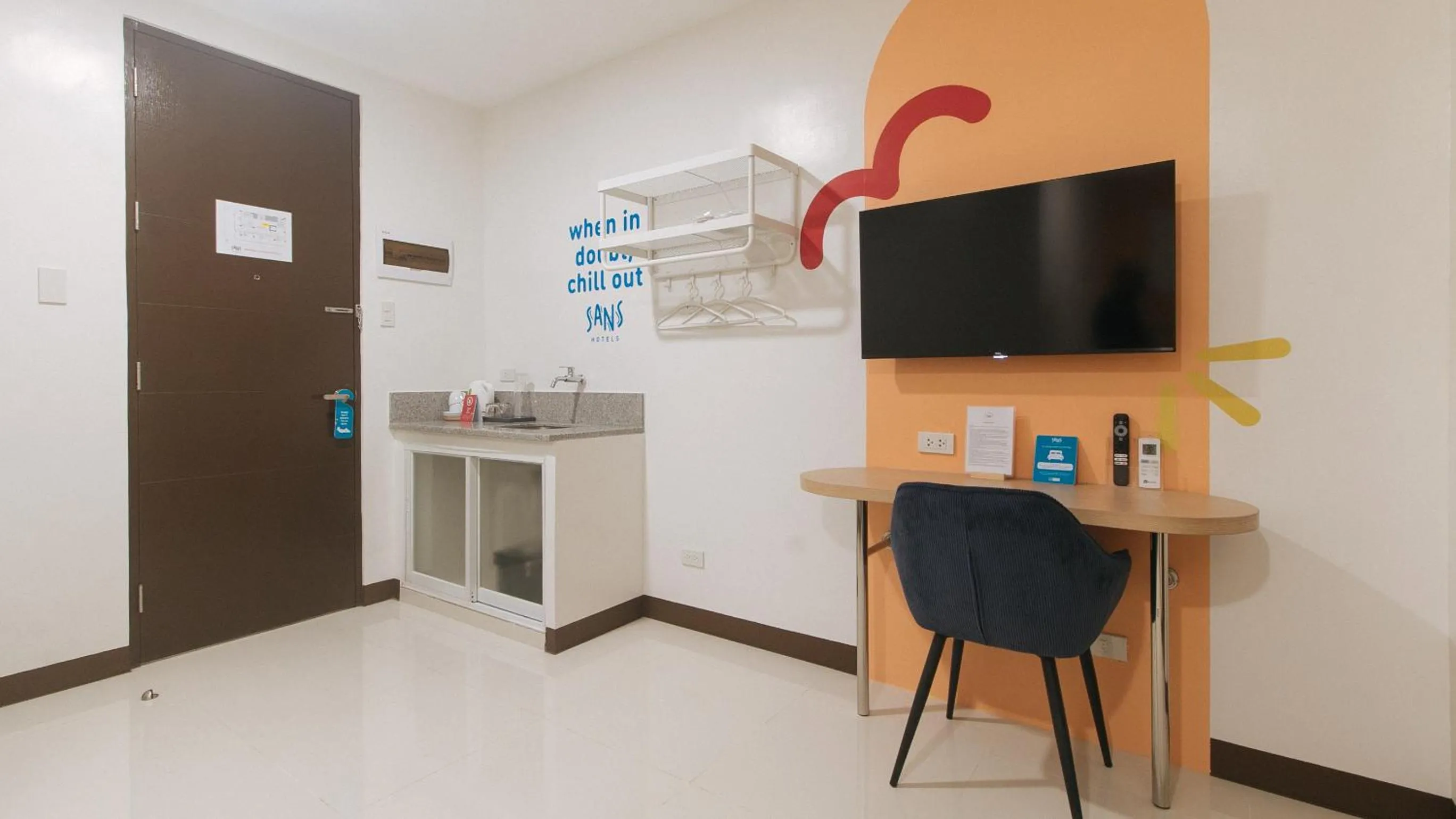 TV and multimedia in Sans Hotel at One JD Place Makati by RedDoorz