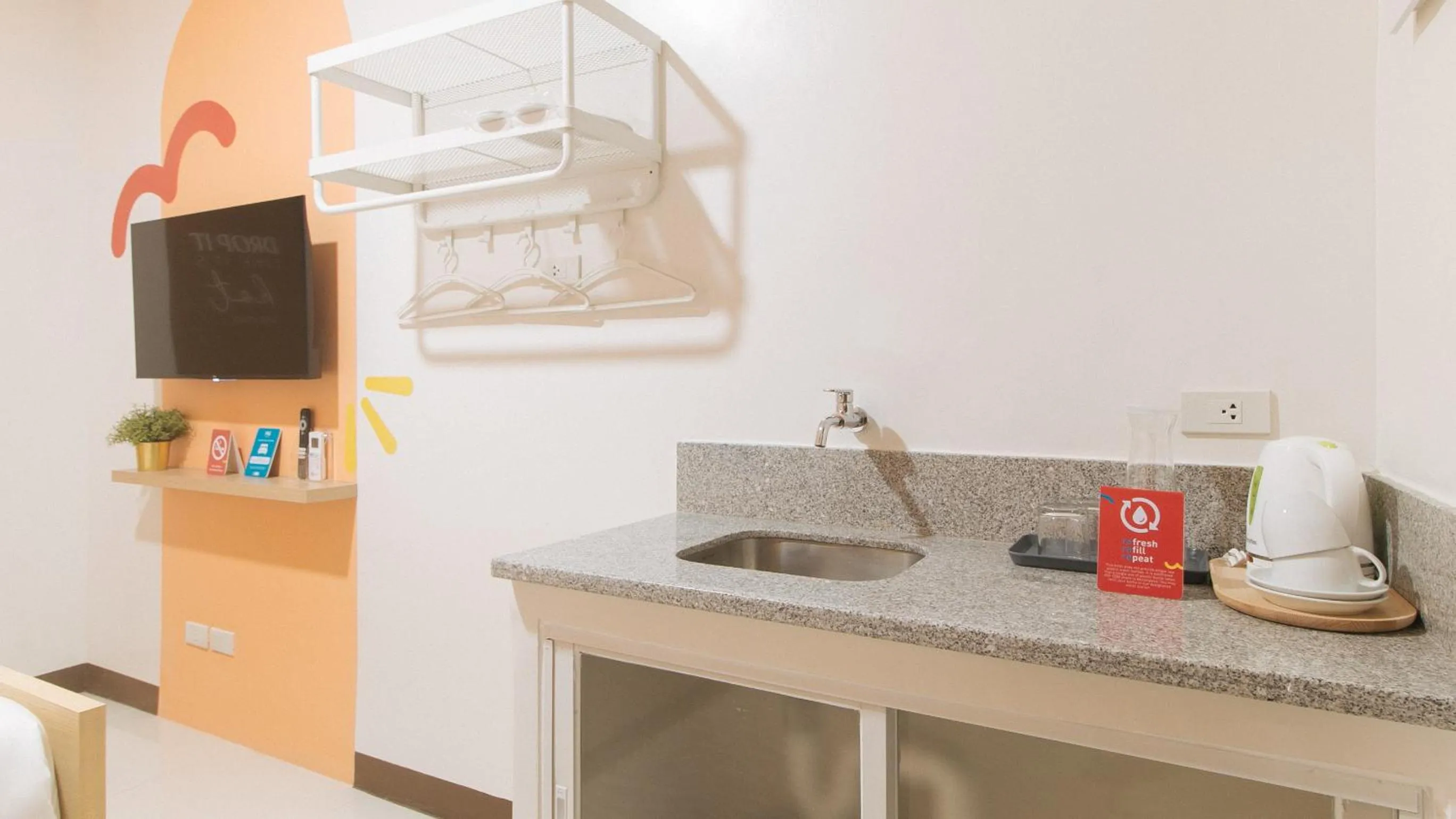 TV and multimedia in Sans Hotel at One JD Place Makati by RedDoorz