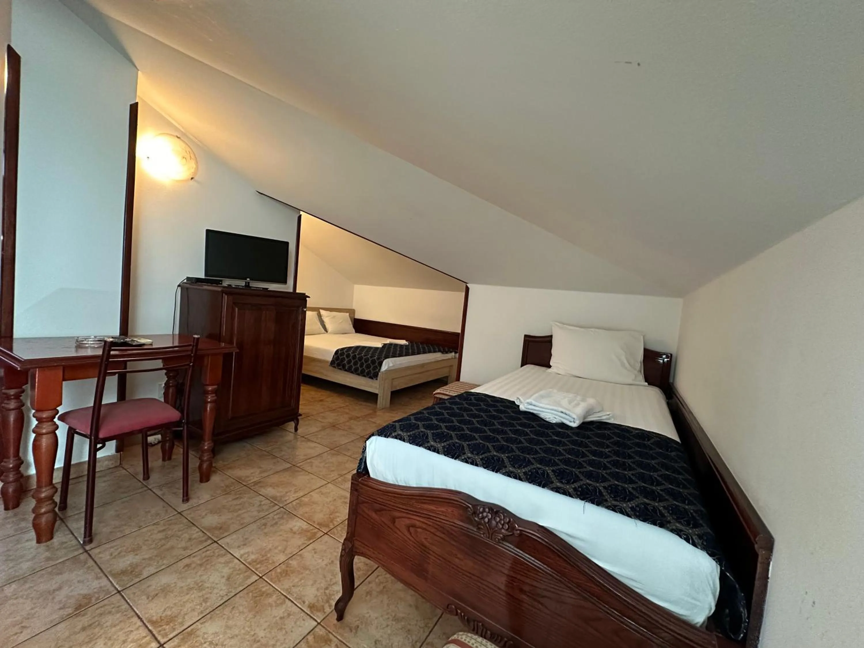 Bed in Beatrix Lux Hotel