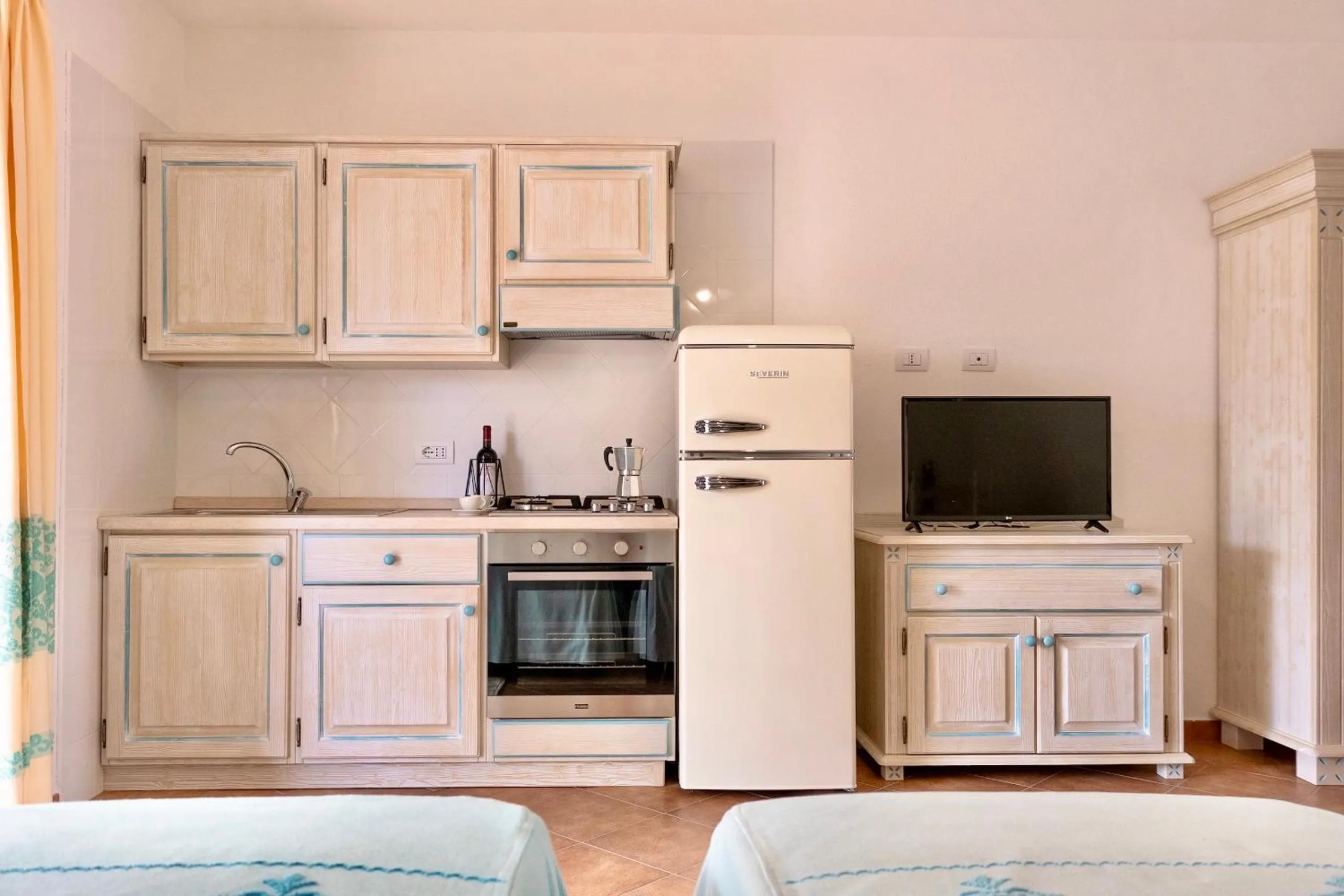 Kitchen or kitchenette in Apartments with air conditioning in Orosei
