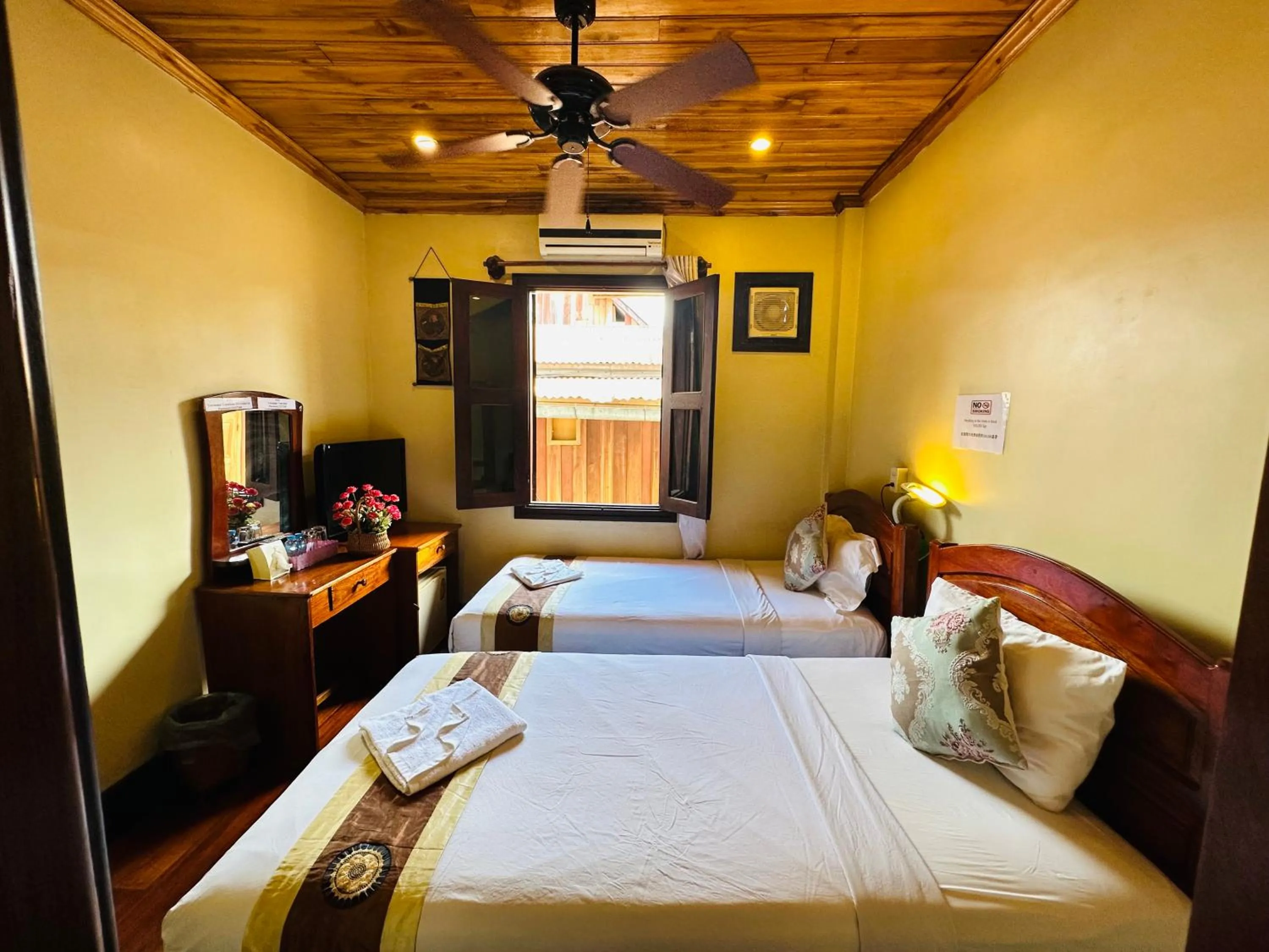 Bed in Anisa Mekong Riverside Villa