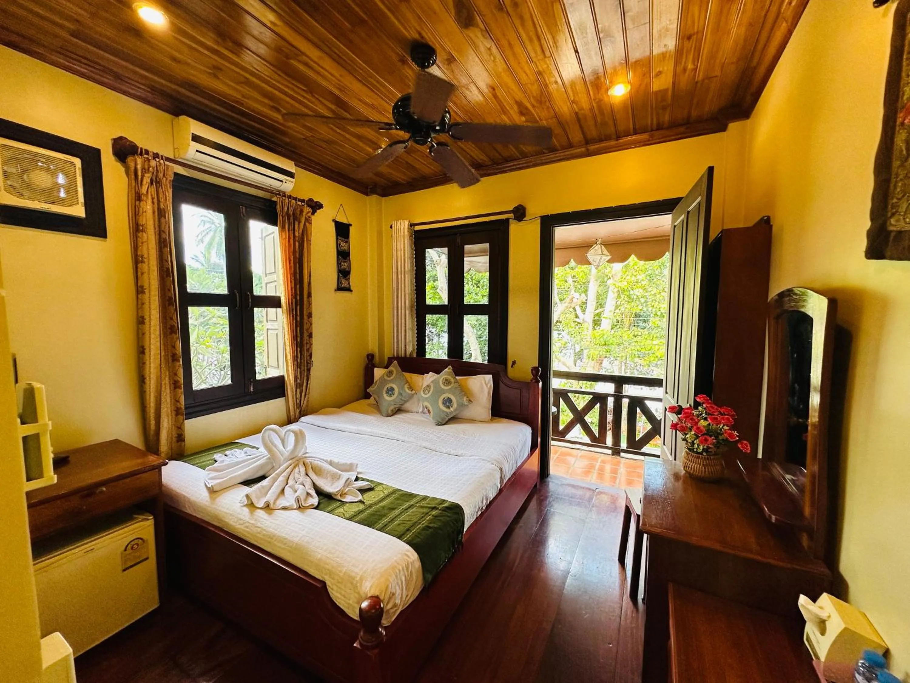 Bed in Anisa Mekong Riverside Villa