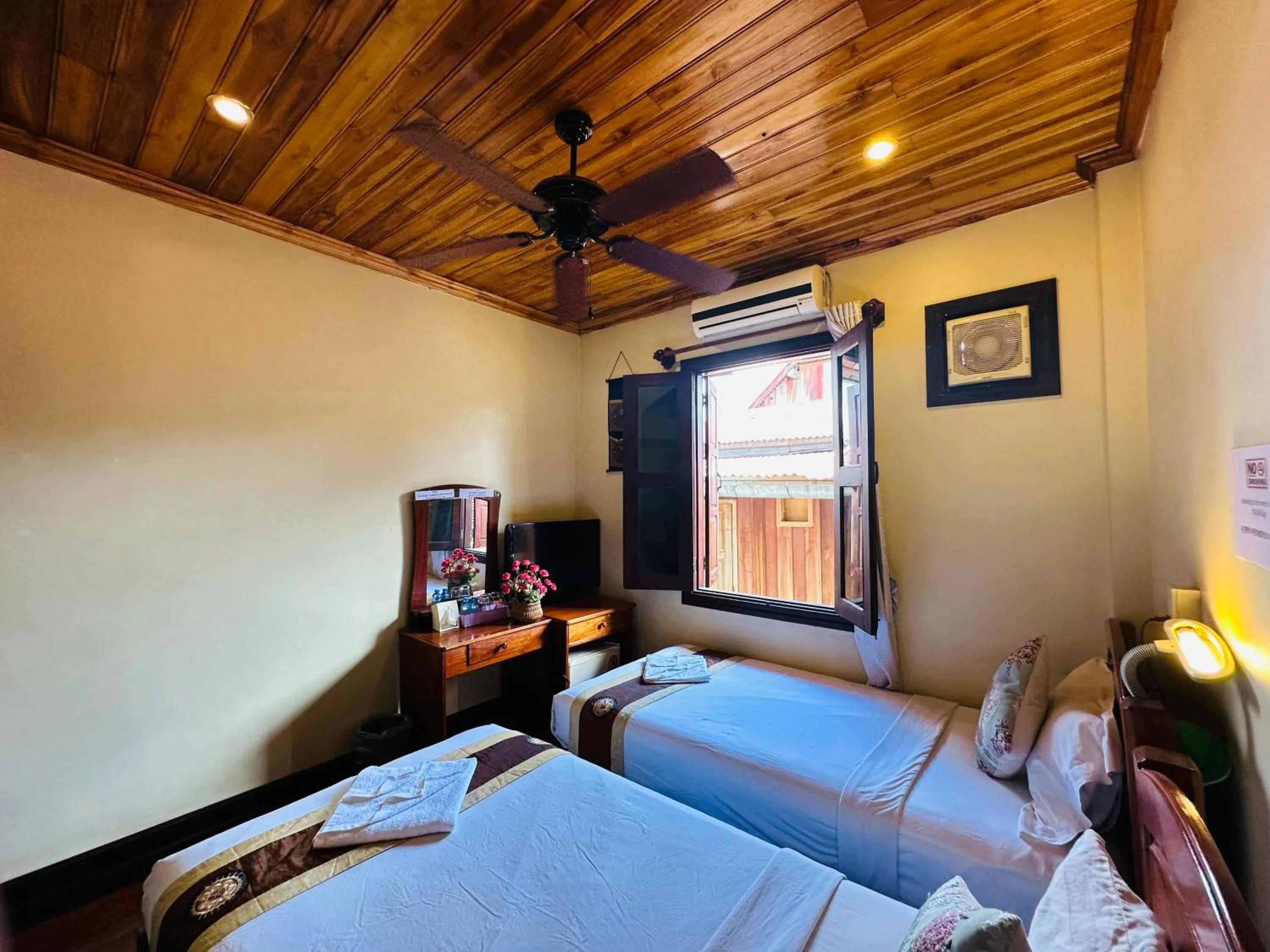 Bed in Anisa Mekong Riverside Villa