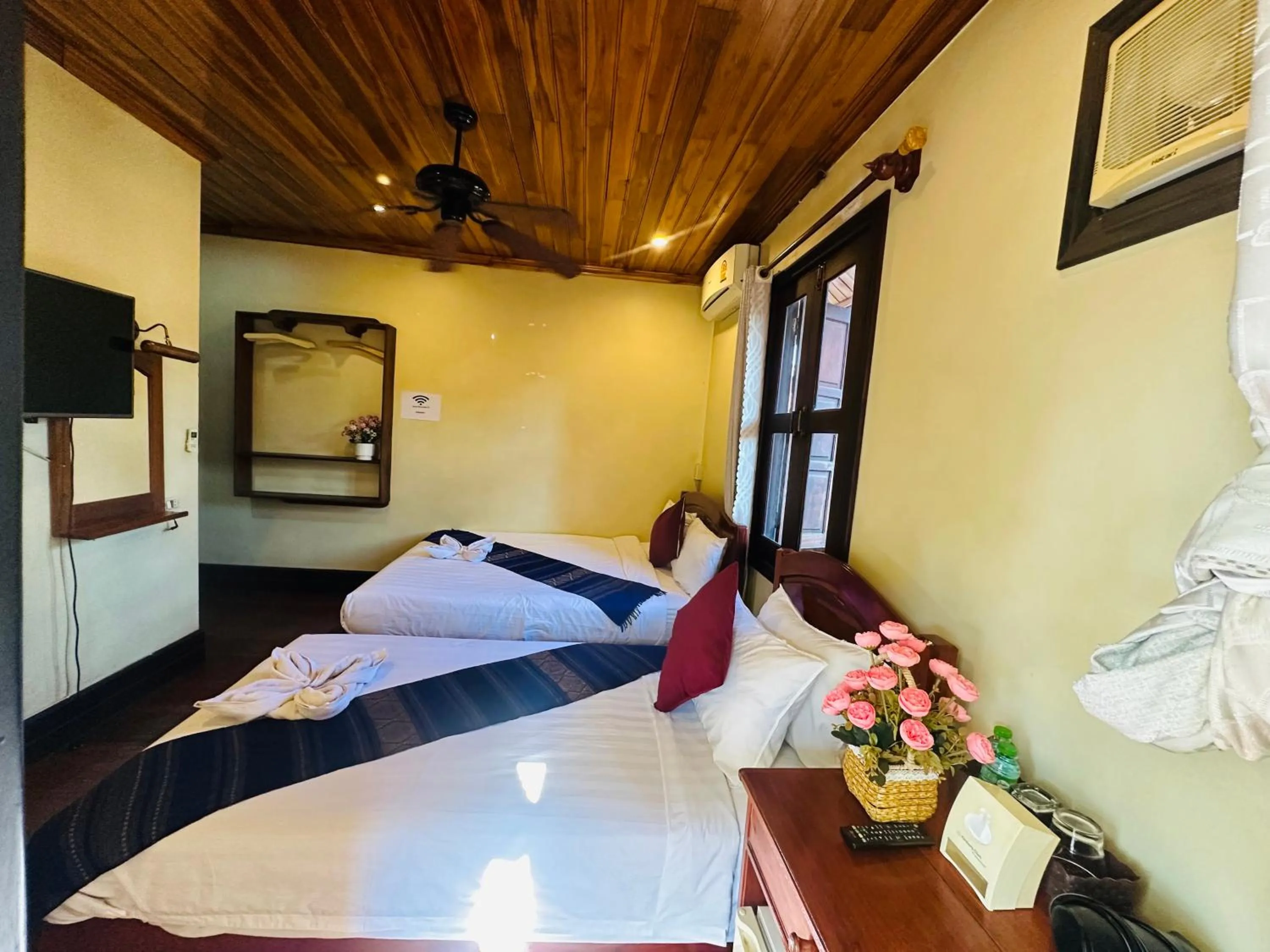 Bed in Anisa Mekong Riverside Villa