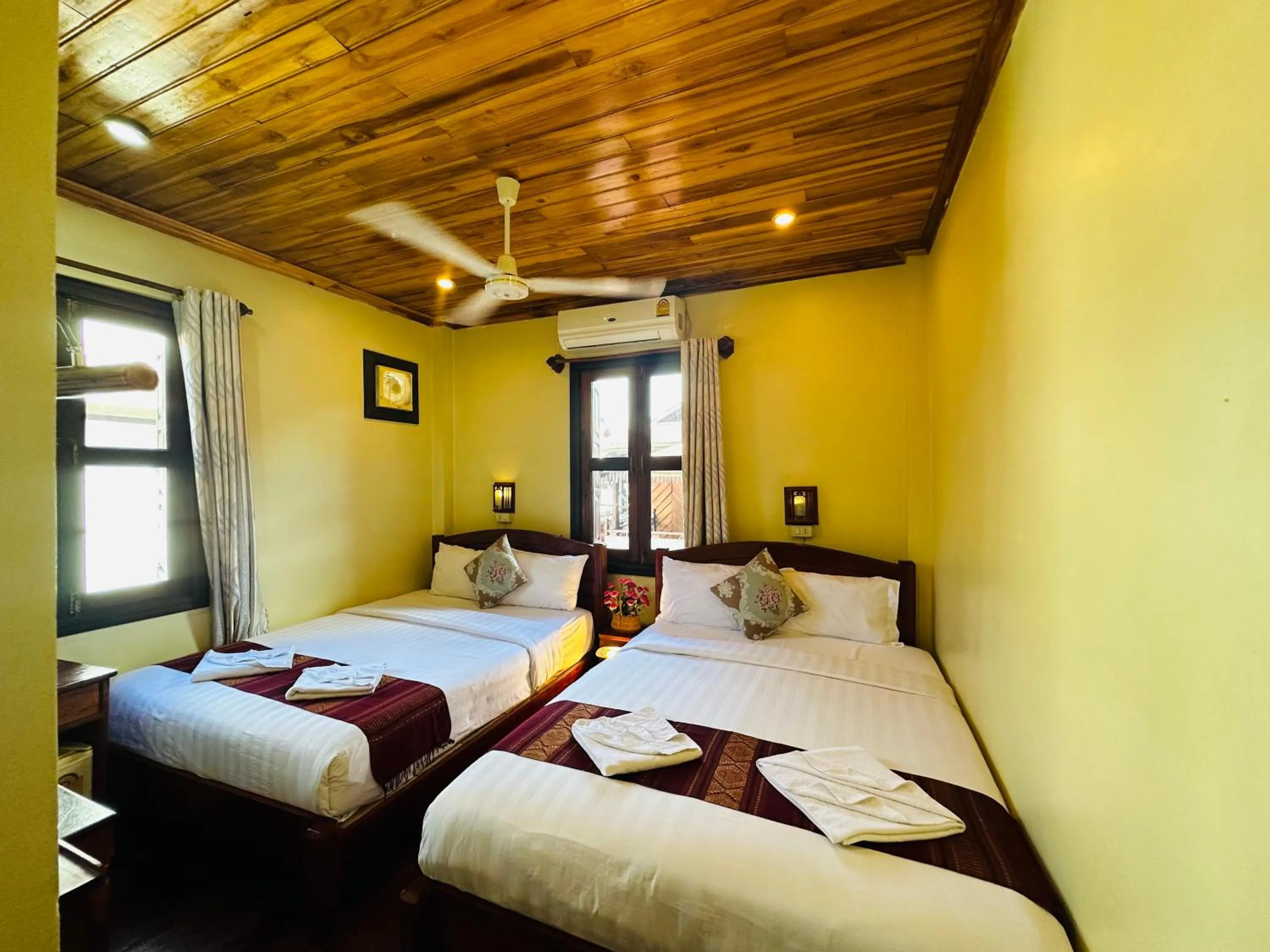 Bed in Anisa Mekong Riverside Villa