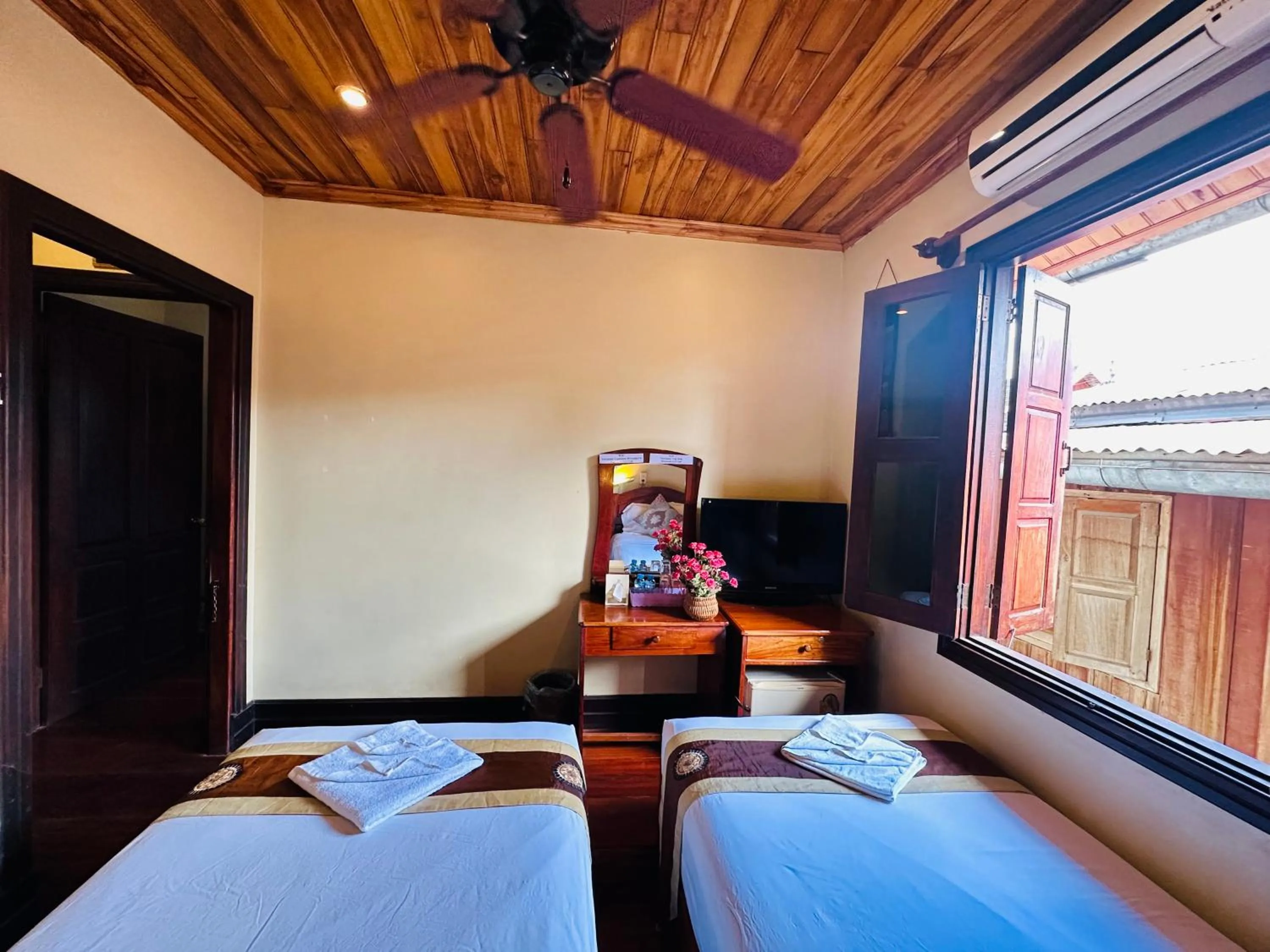 Bed in Anisa Mekong Riverside Villa