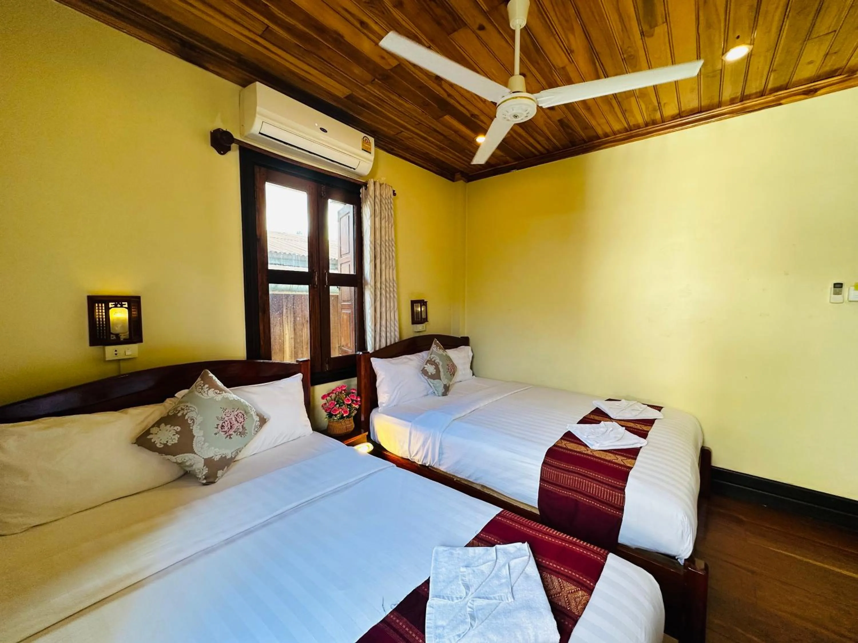 Bed in Anisa Mekong Riverside Villa