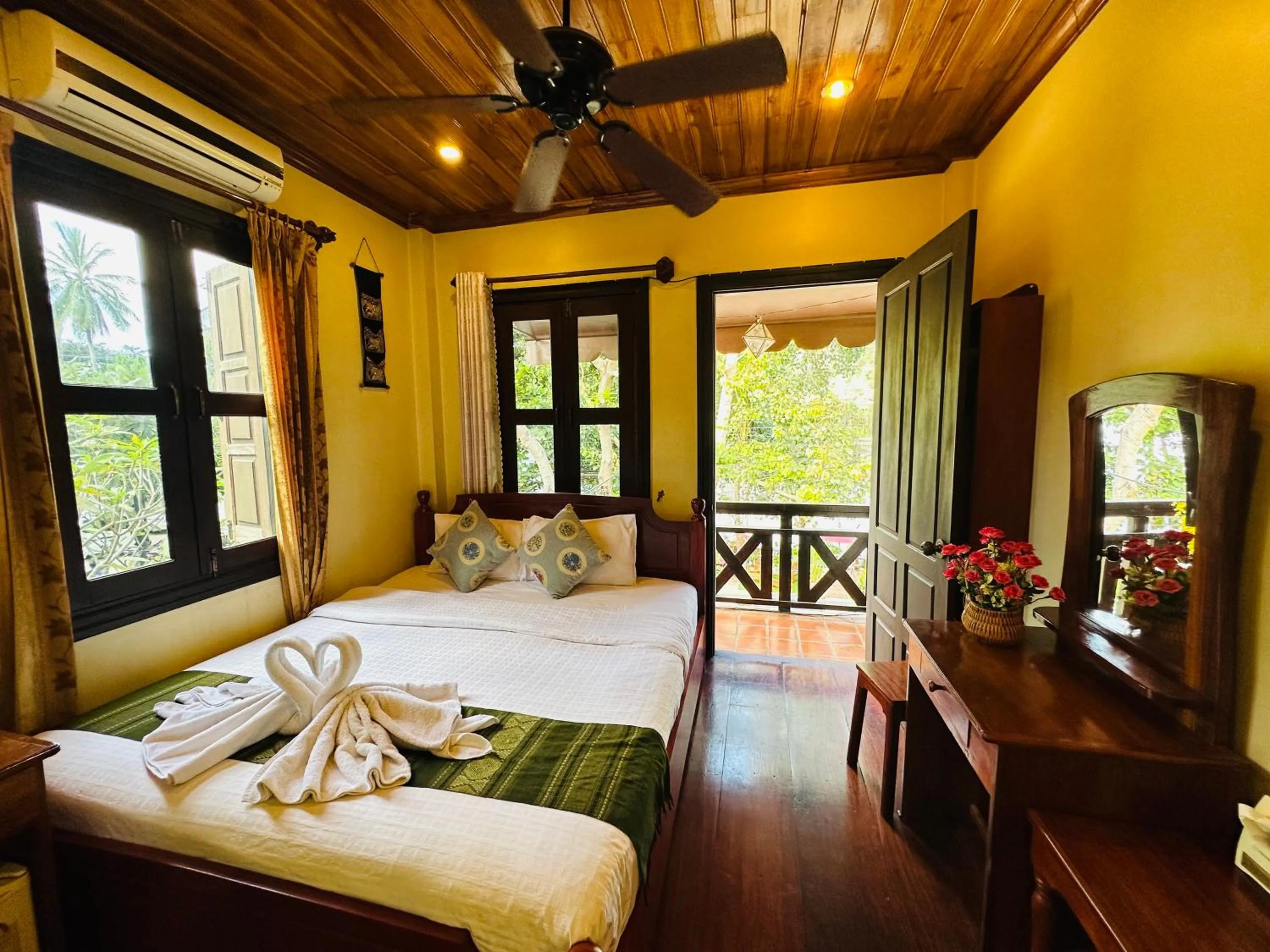 Bed in Anisa Mekong Riverside Villa