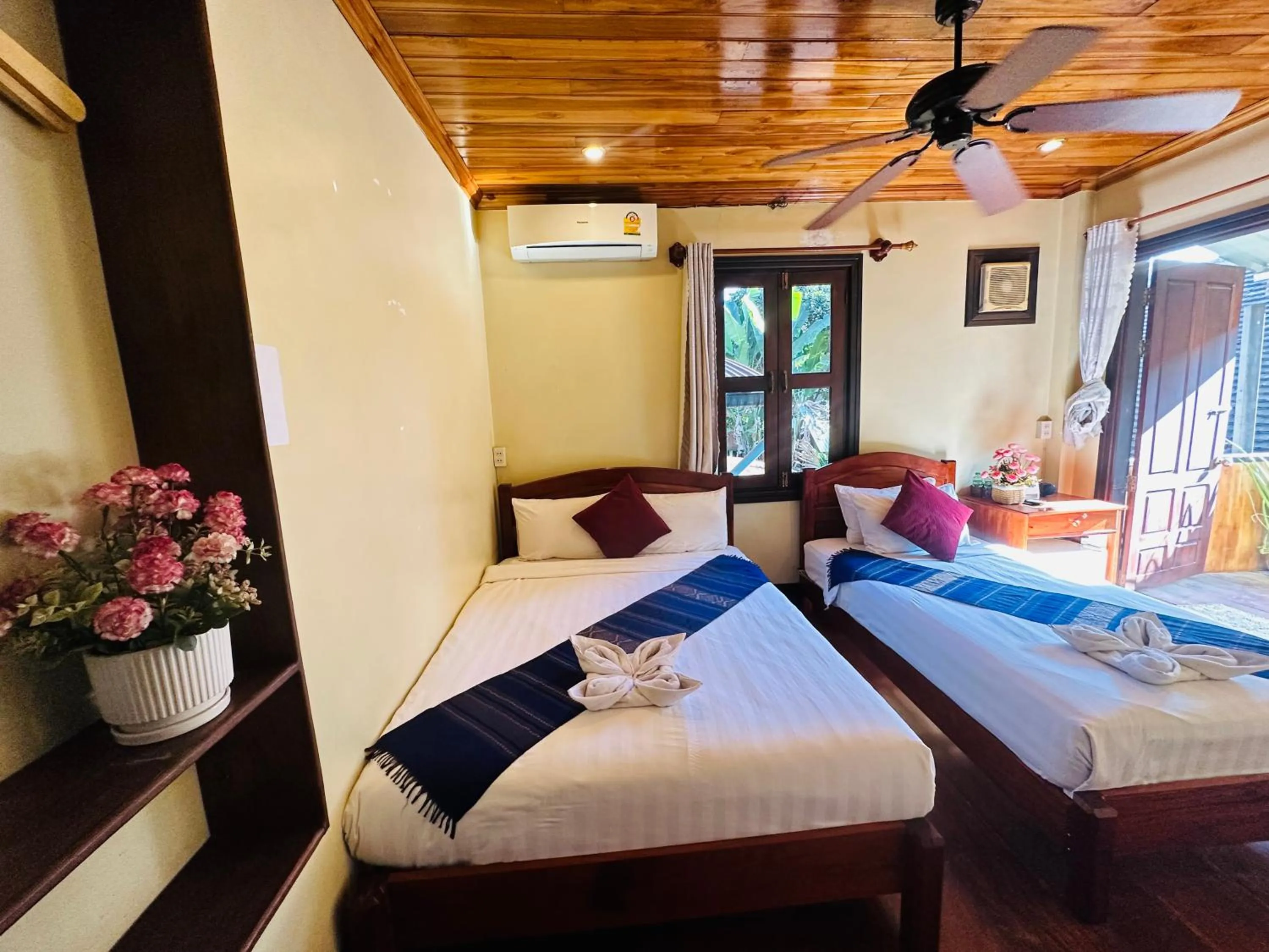 Bed in Anisa Mekong Riverside Villa