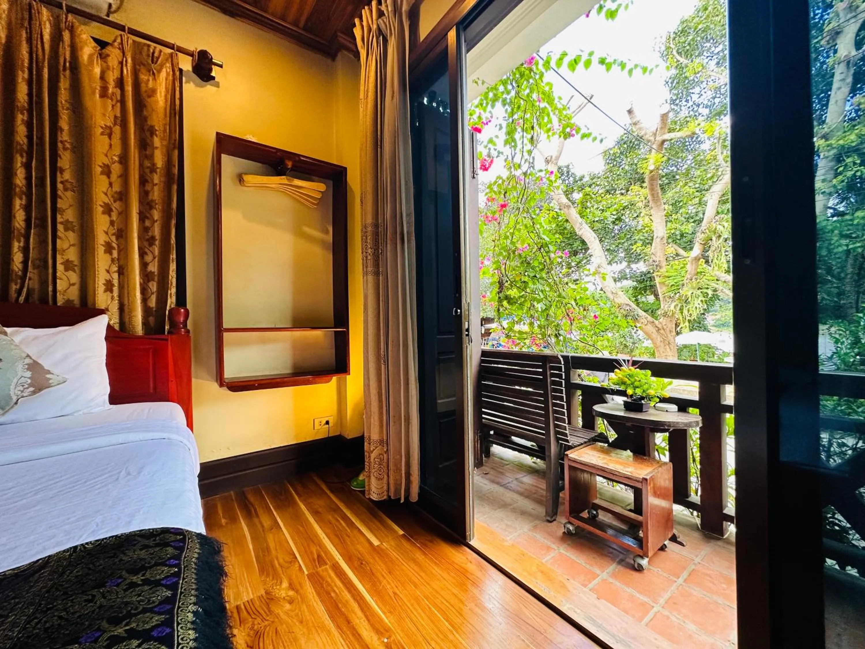 Patio, Bed in Anisa Mekong Riverside Villa