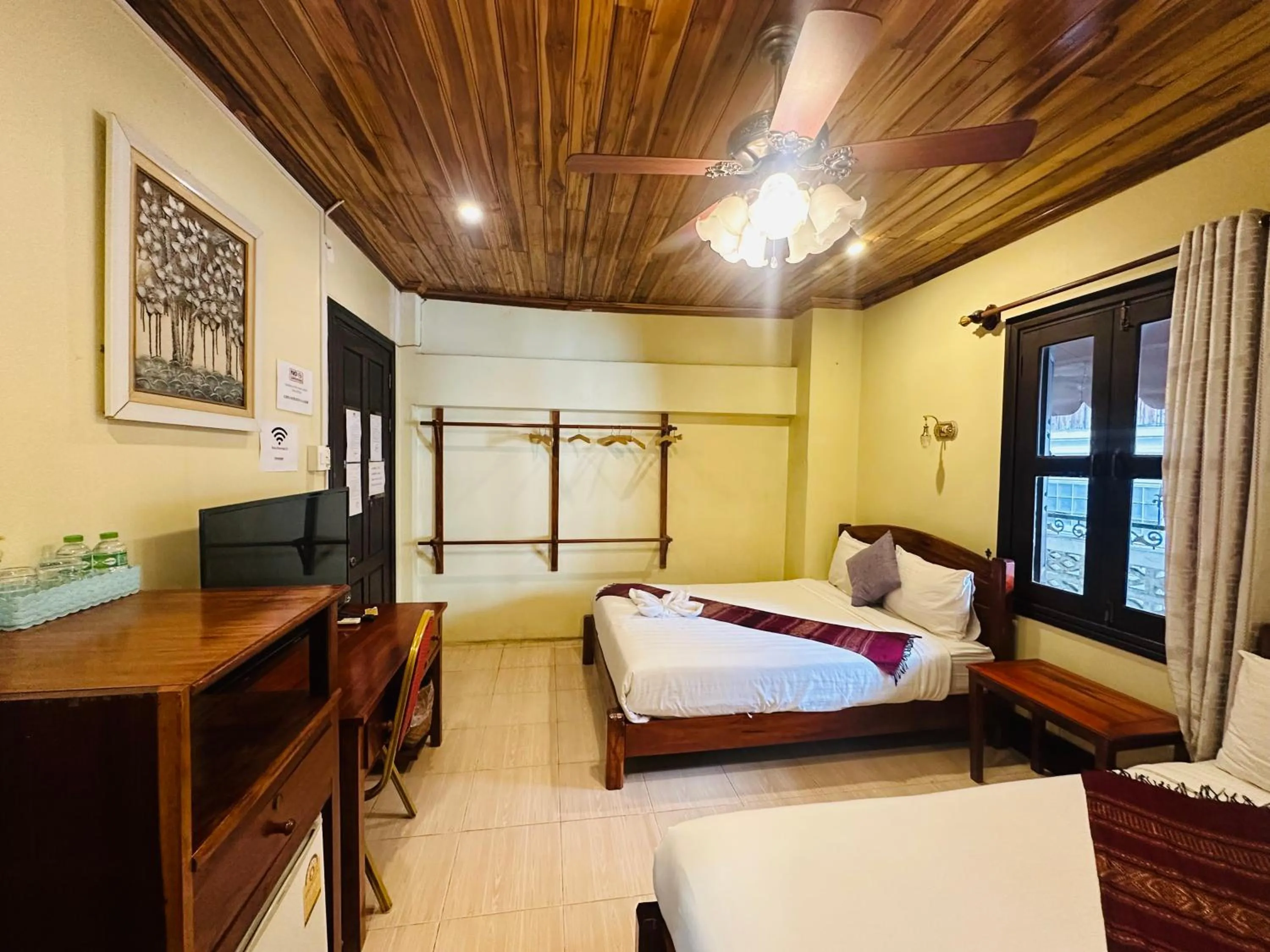 Bed in Anisa Mekong Riverside Villa