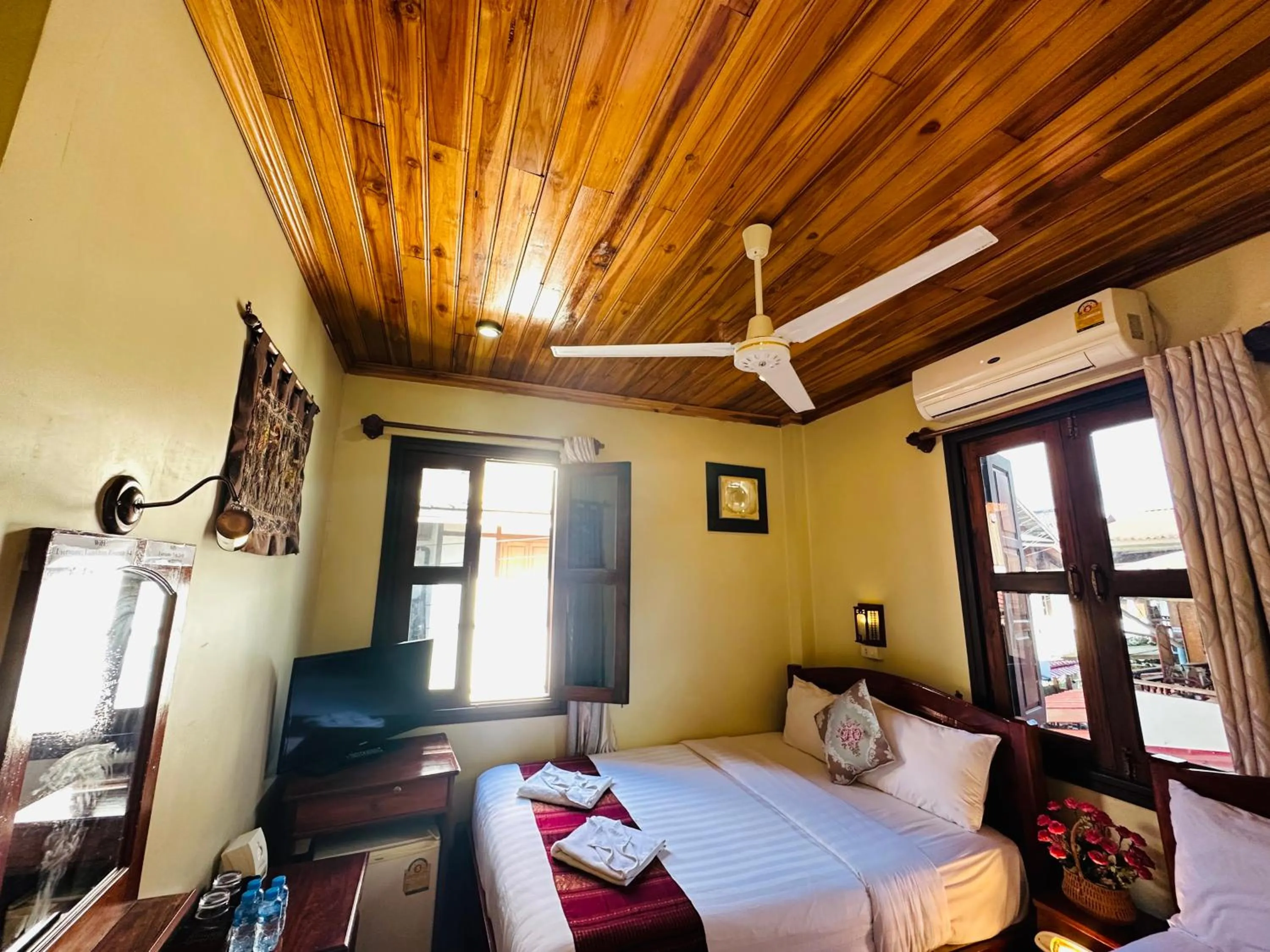 Bed in Anisa Mekong Riverside Villa