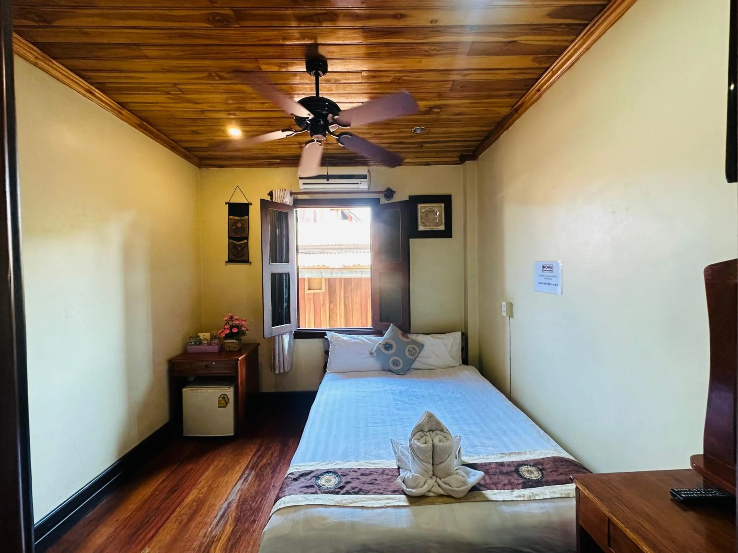 Bed in Anisa Mekong Riverside Villa