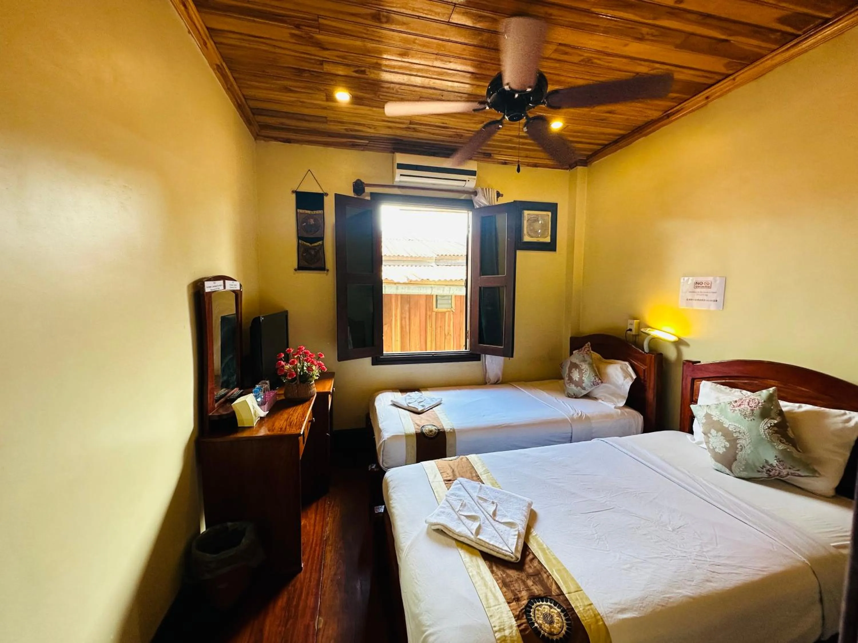 Bed in Anisa Mekong Riverside Villa