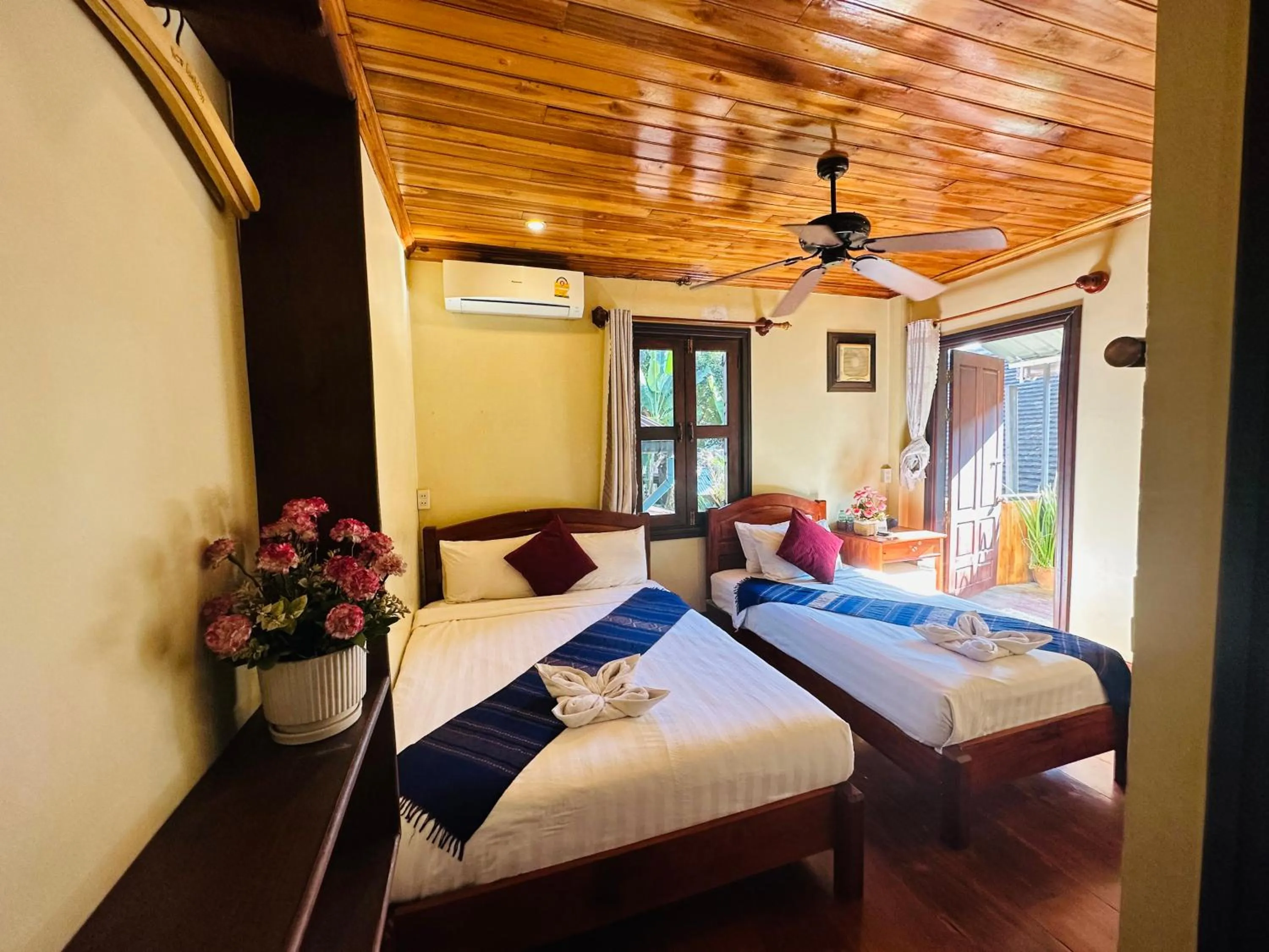 Bed in Anisa Mekong Riverside Villa