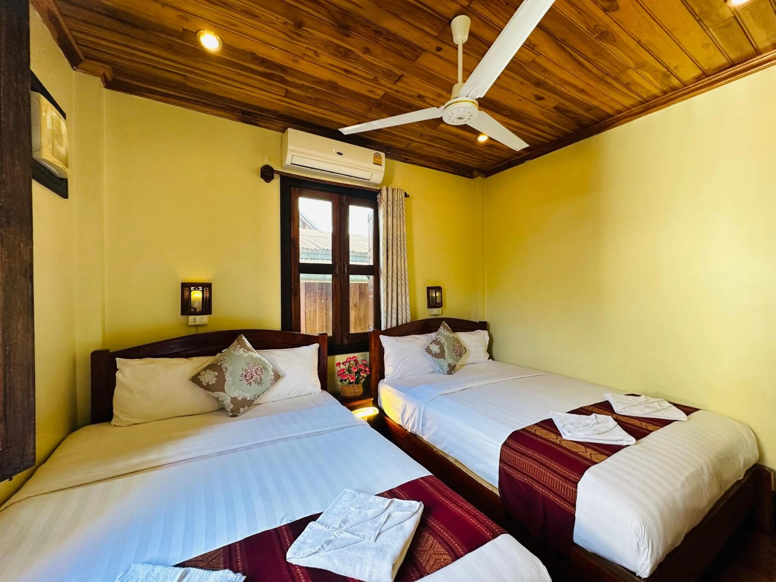 Bed in Anisa Mekong Riverside Villa