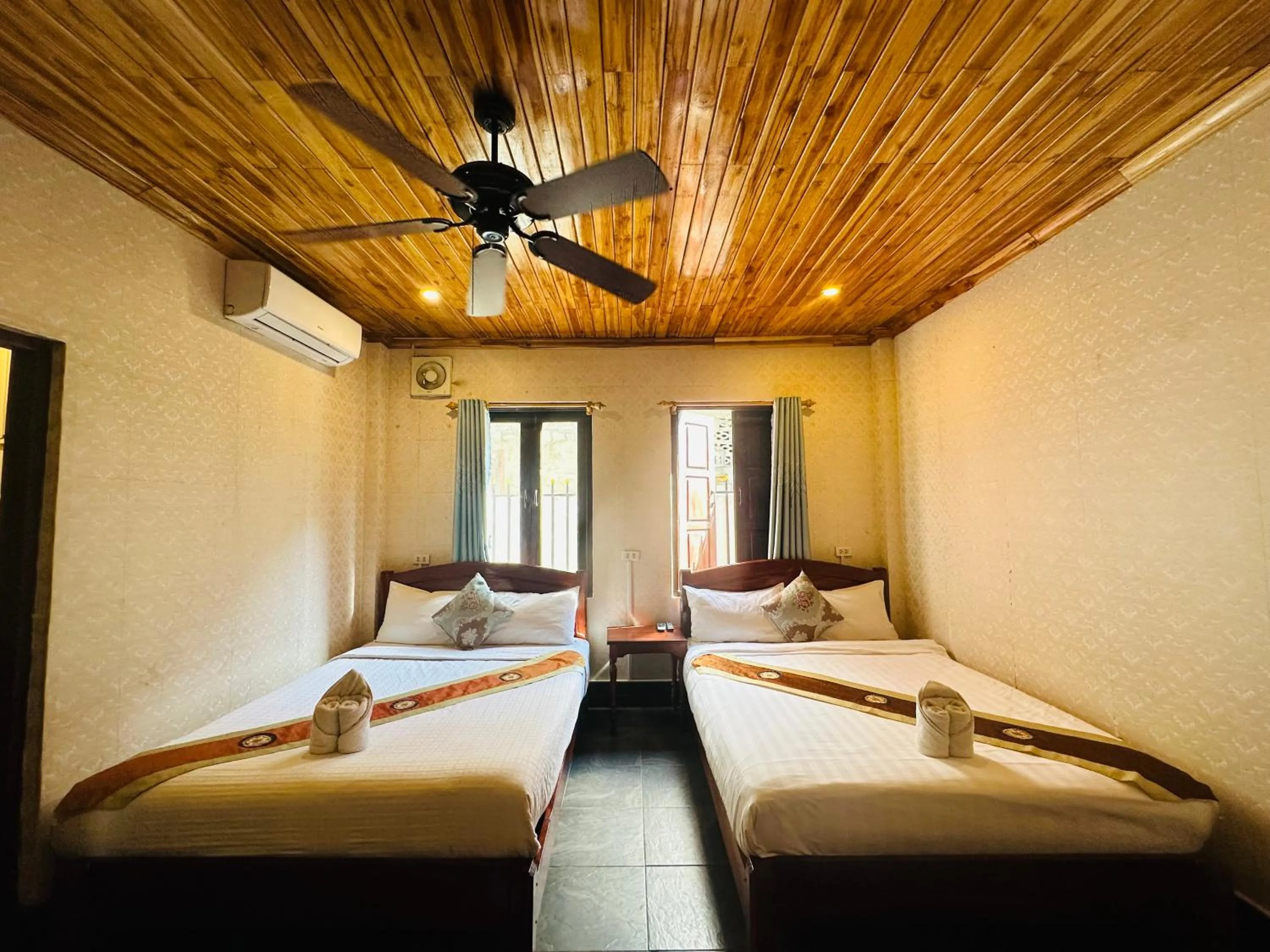 Bed in Anisa Mekong Riverside Villa