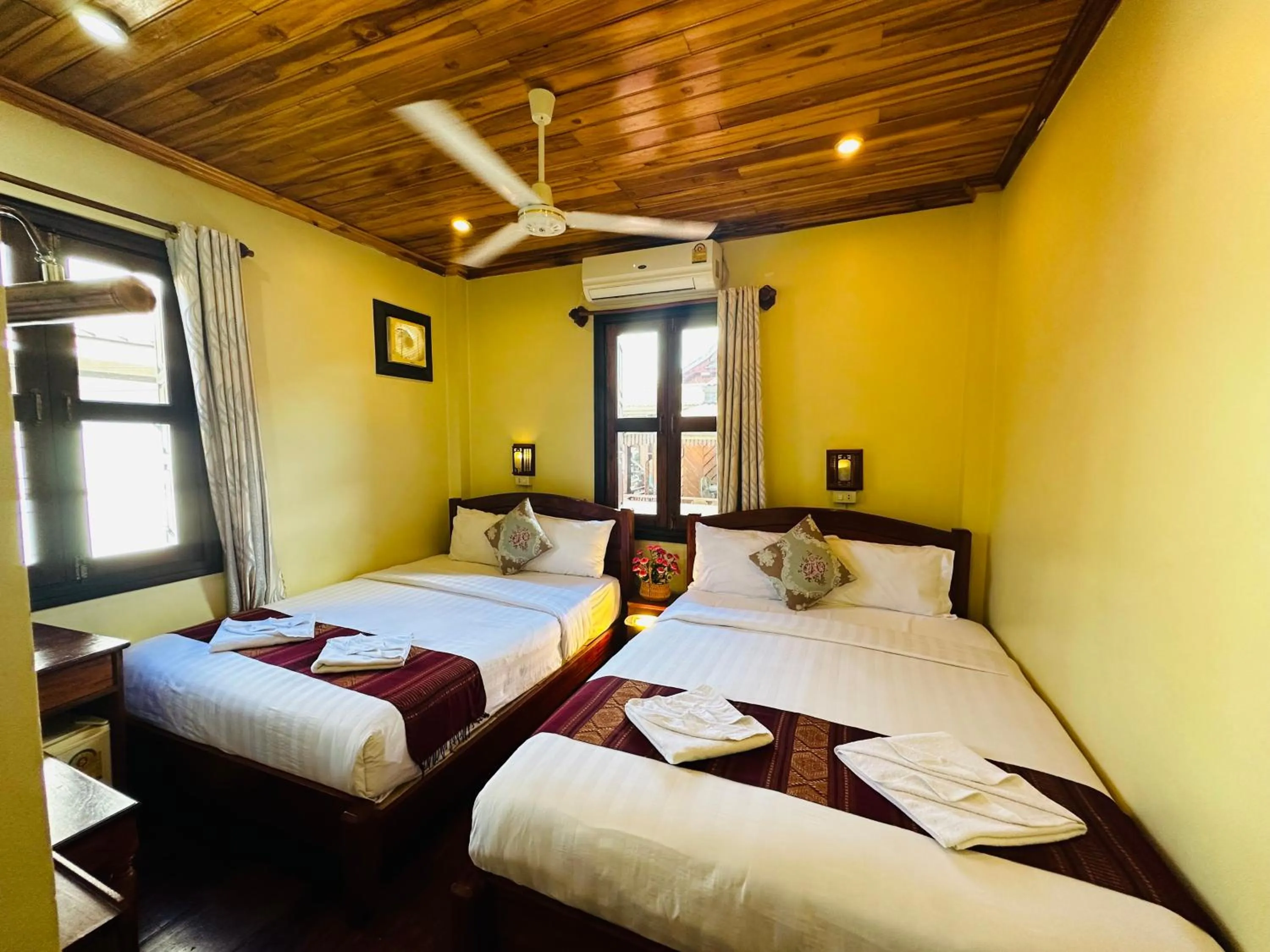 Bed in Anisa Mekong Riverside Villa