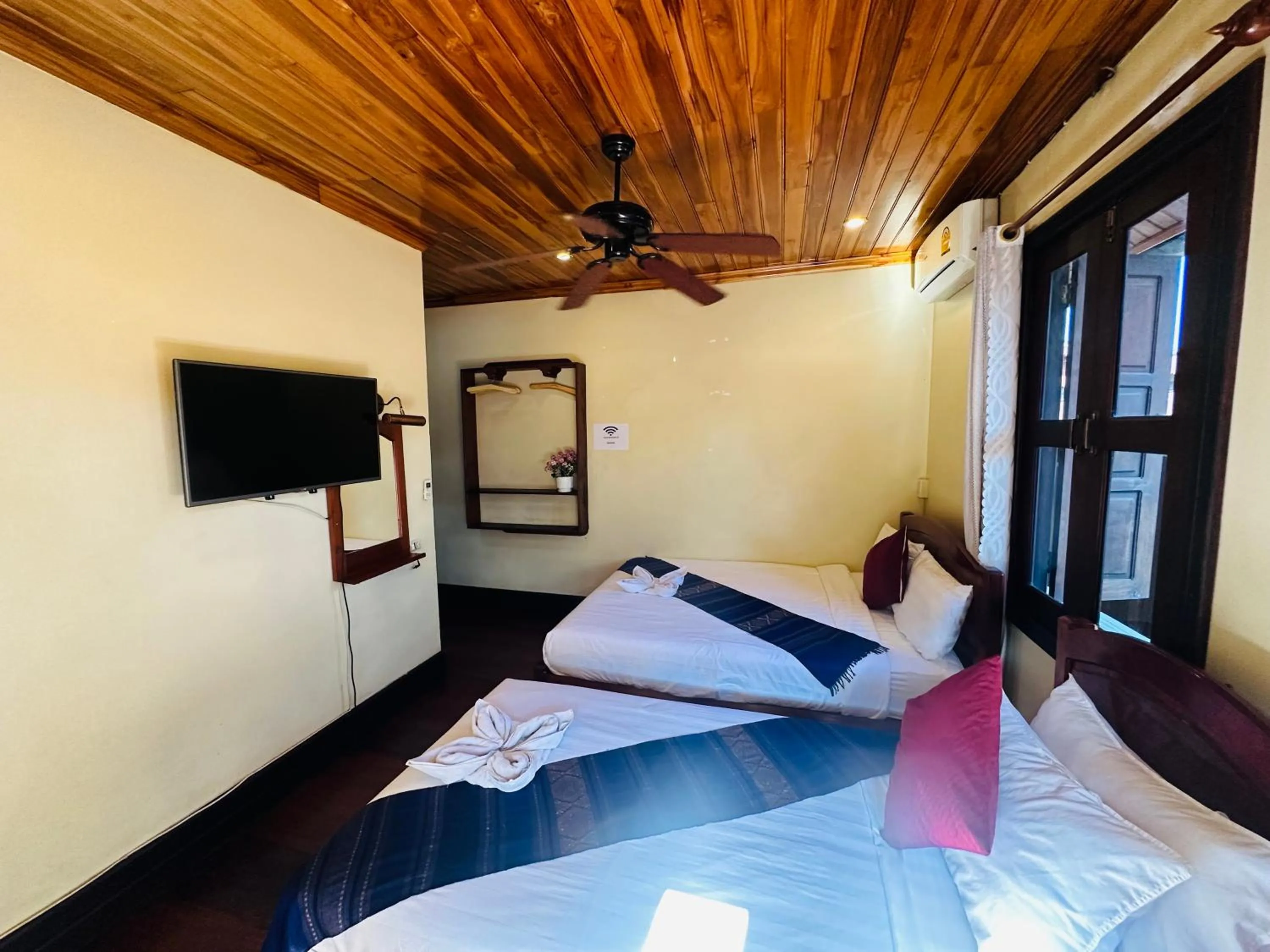 Bed in Anisa Mekong Riverside Villa