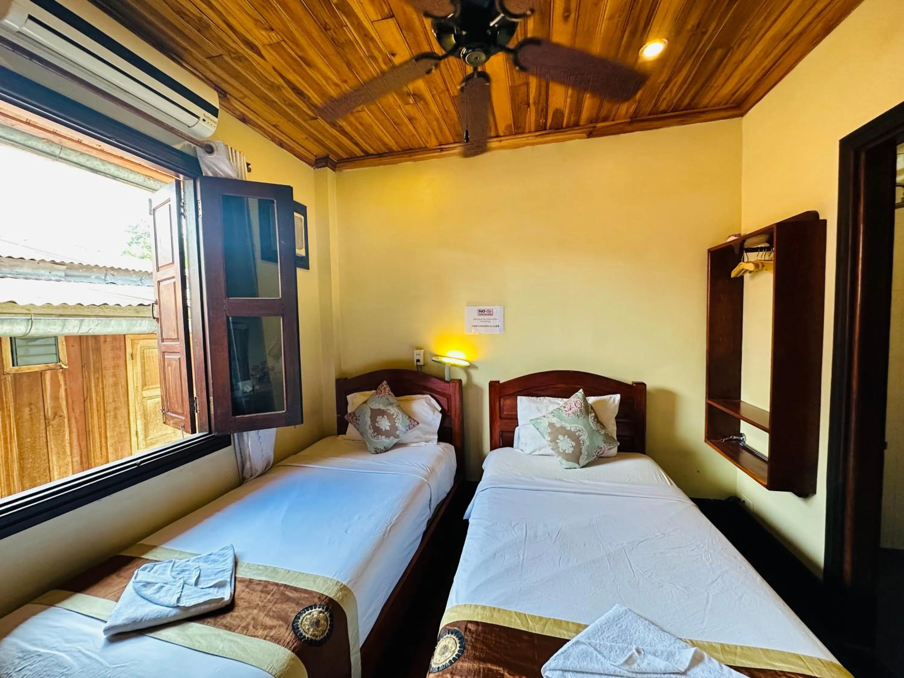 Bed in Anisa Mekong Riverside Villa