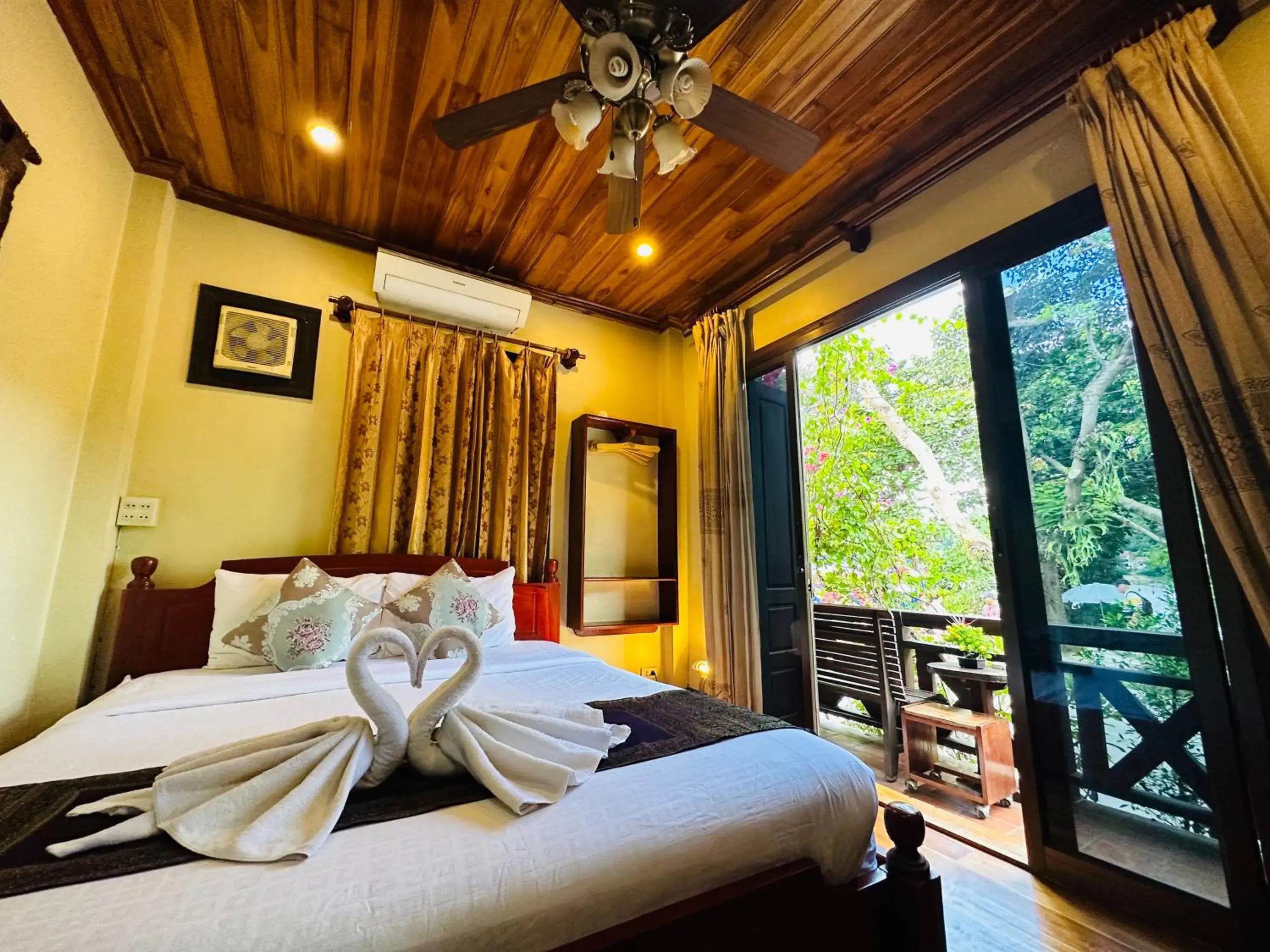 Bed in Anisa Mekong Riverside Villa Bed in Anisa Mekong Riverside Villa