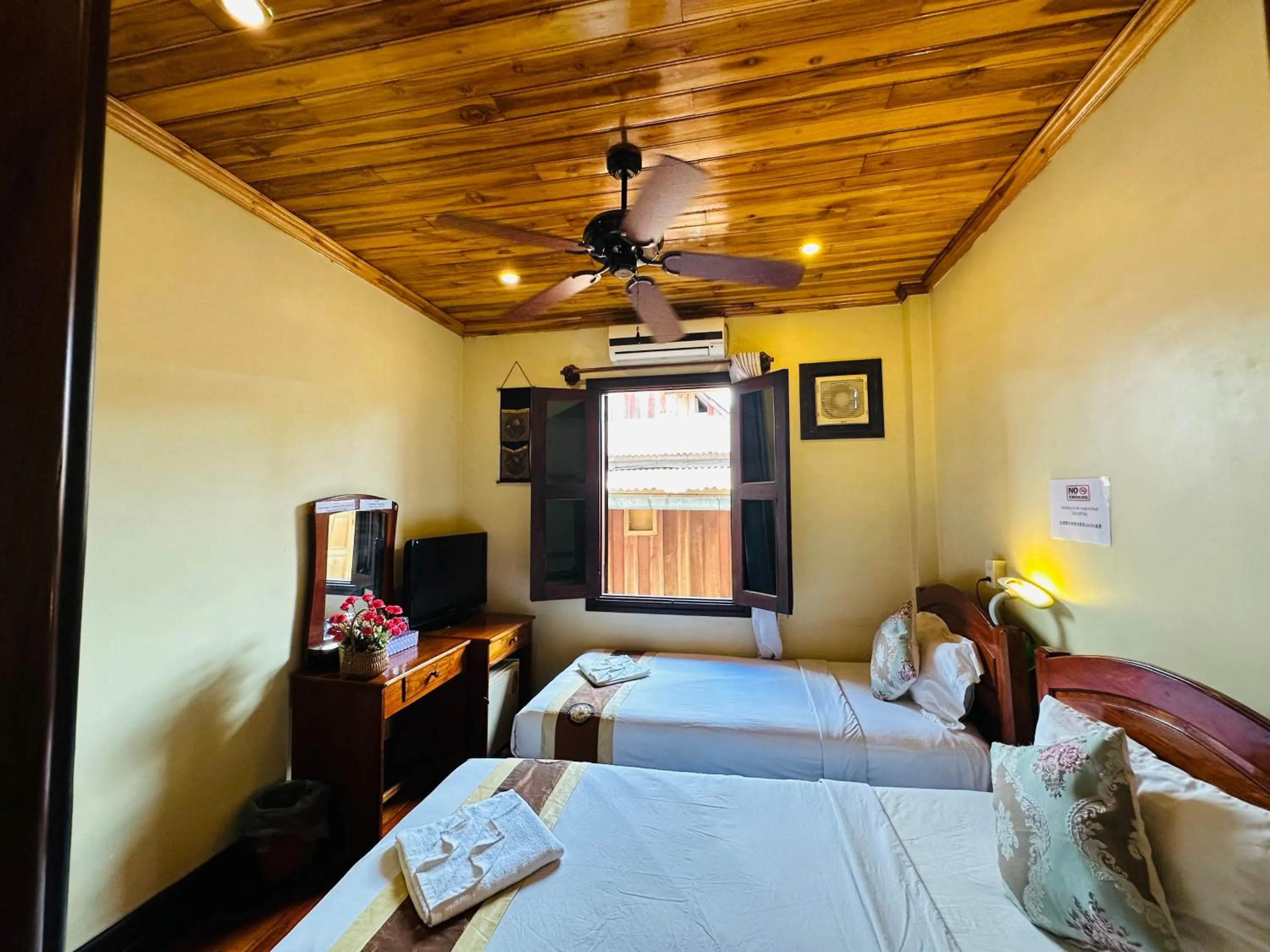 Communal lounge/ TV room, Bed in Anisa Mekong Riverside Villa