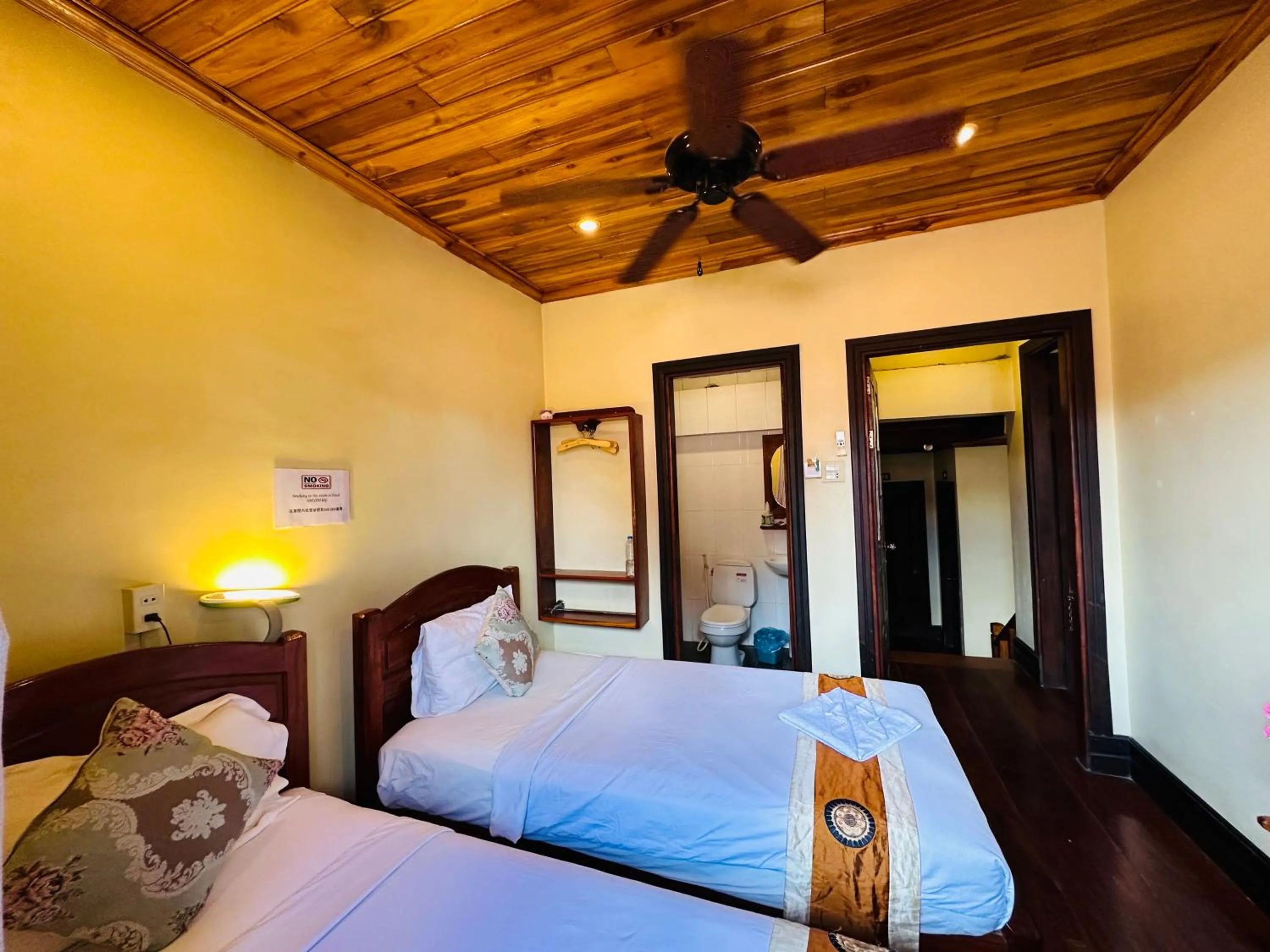 Bed in Anisa Mekong Riverside Villa