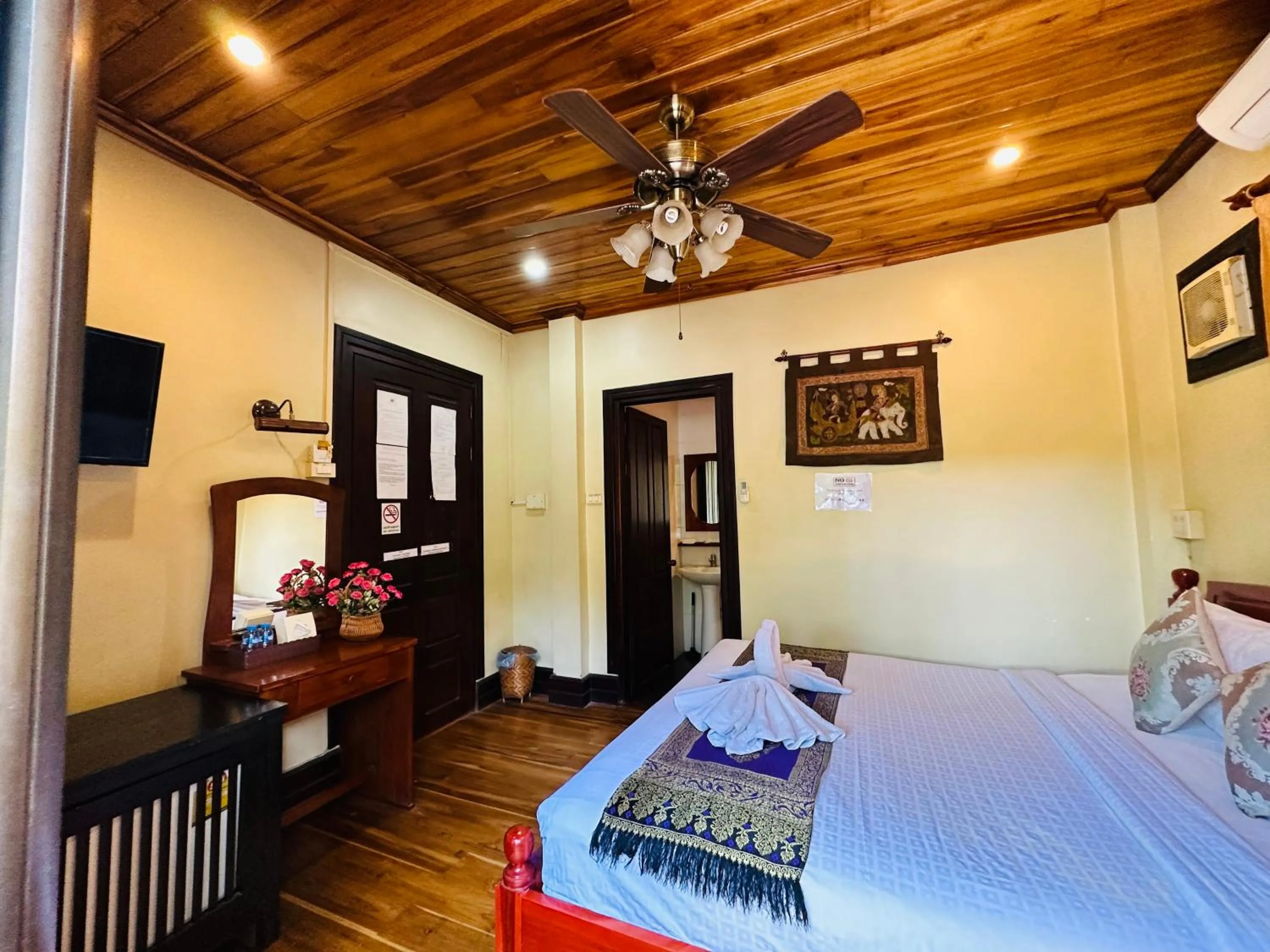 Bed in Anisa Mekong Riverside Villa