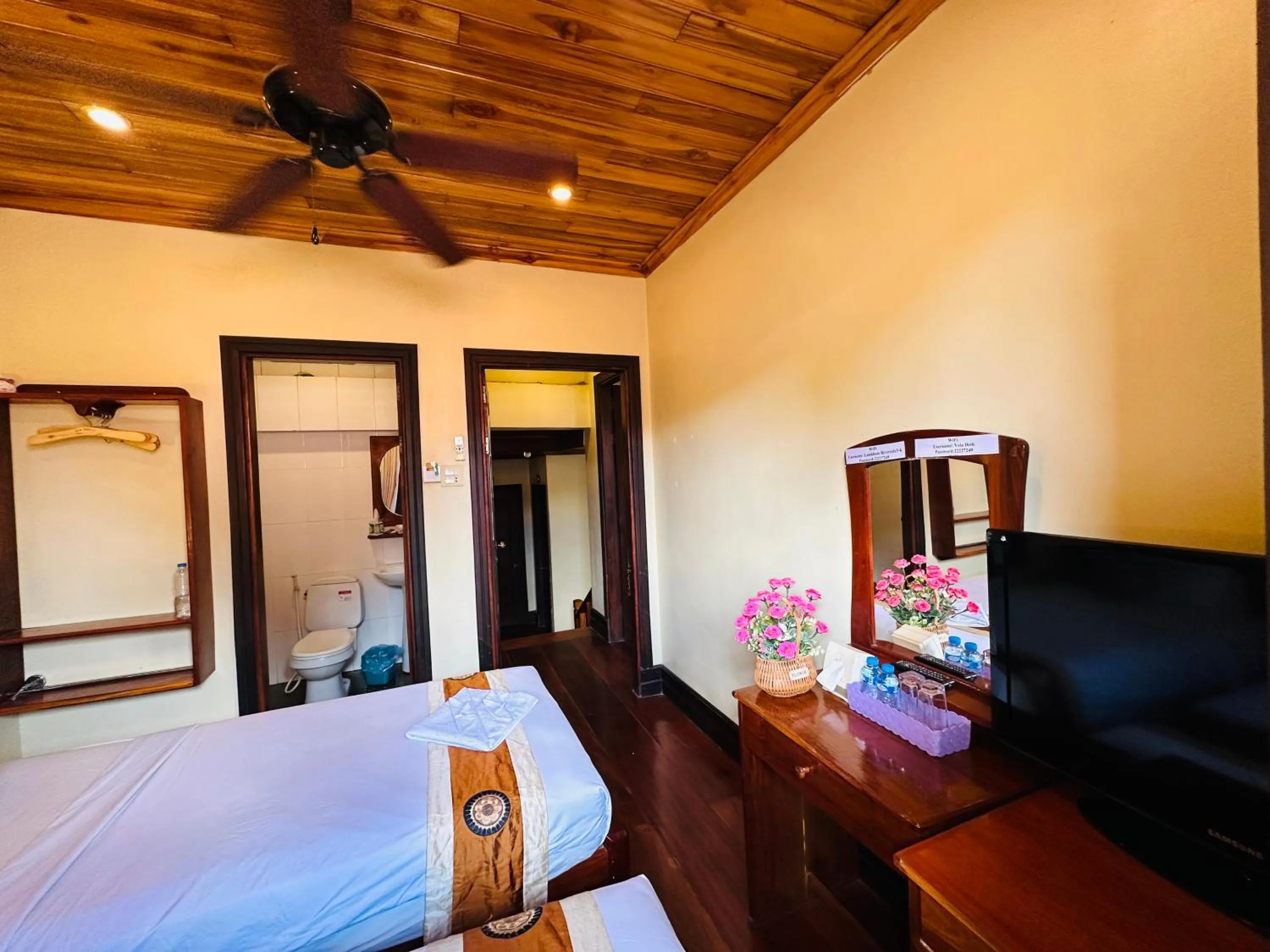 Communal lounge/ TV room, Bed in Anisa Mekong Riverside Villa