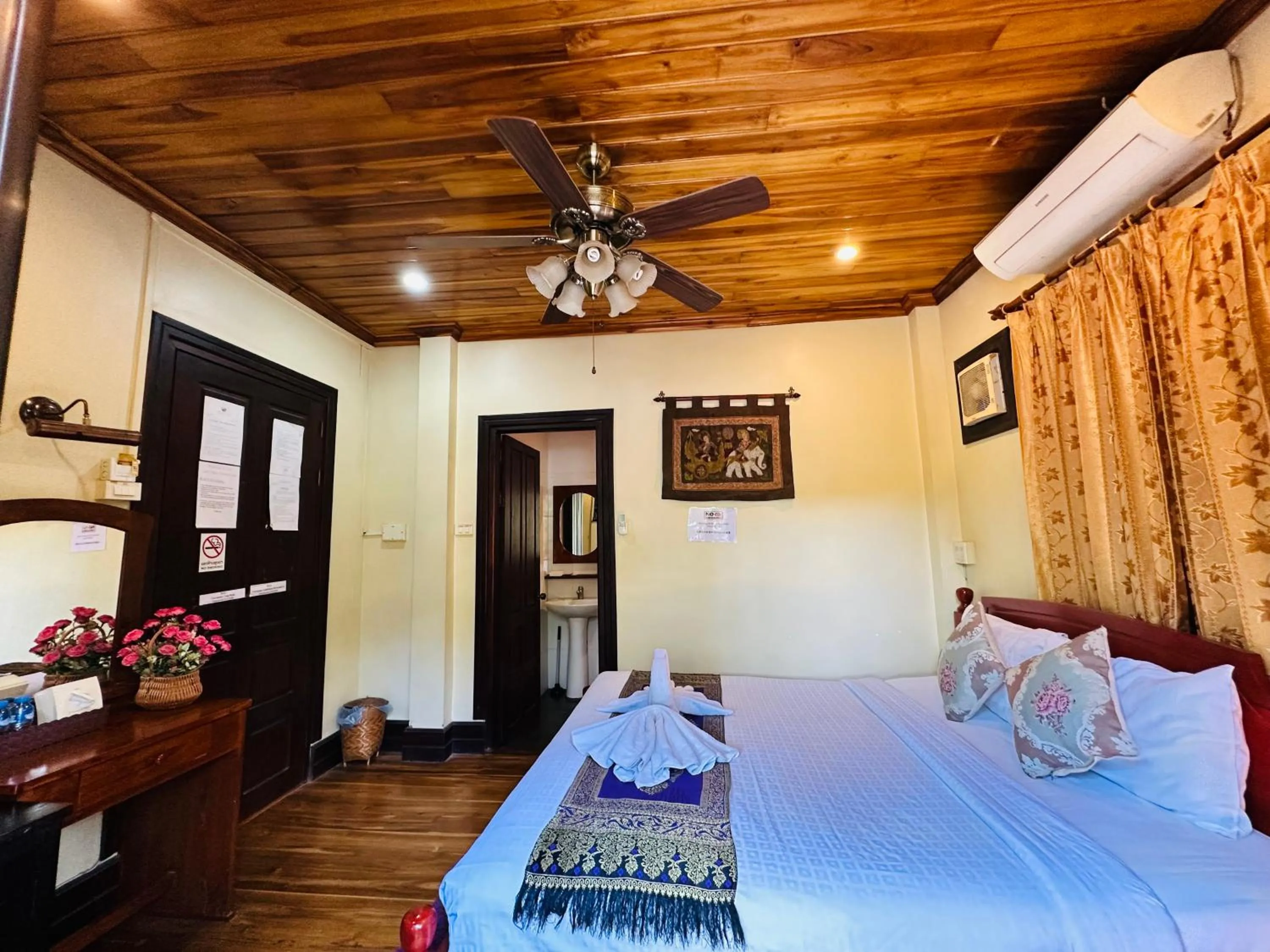 Bed in Anisa Mekong Riverside Villa