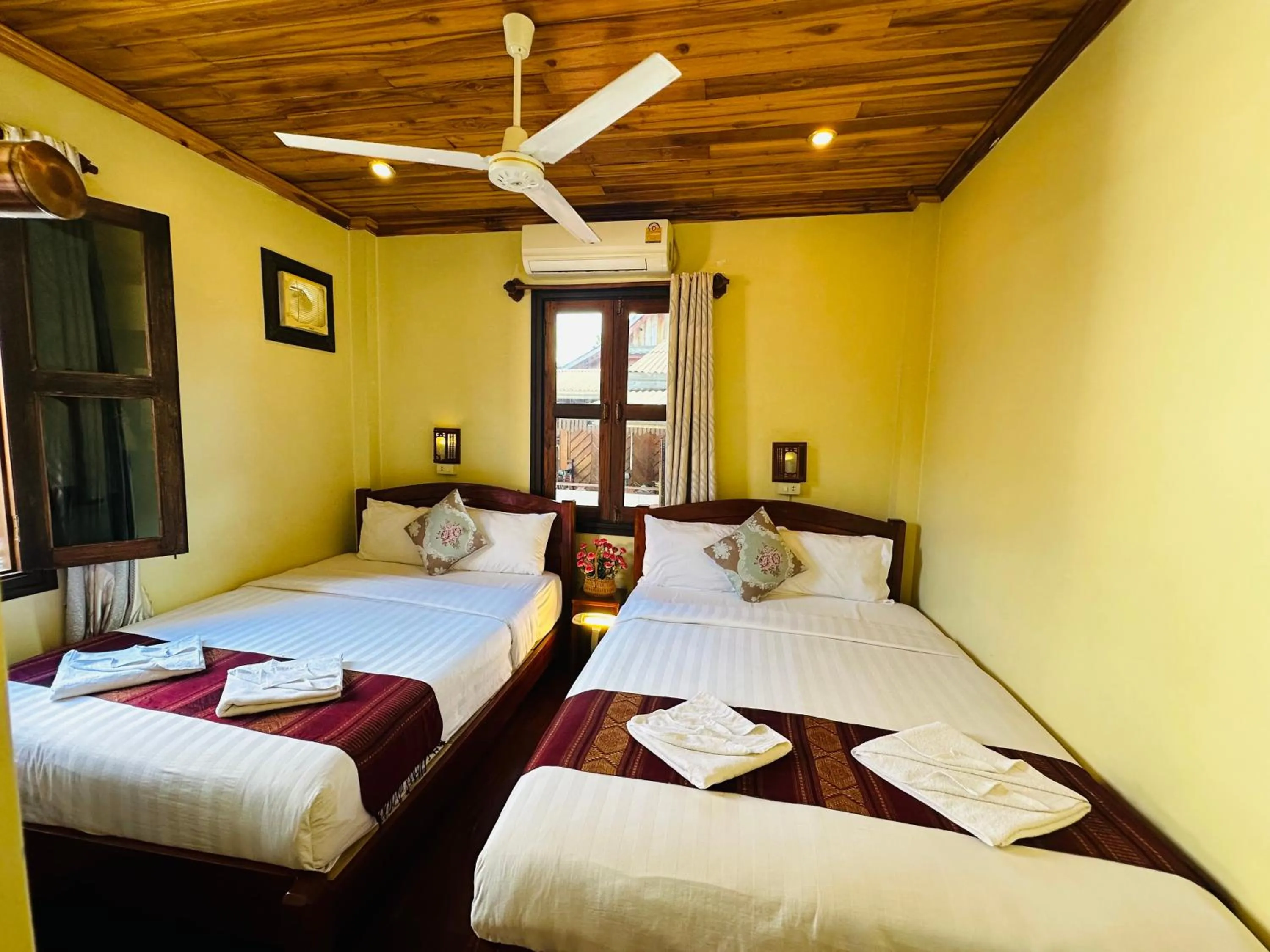 Bed in Anisa Mekong Riverside Villa