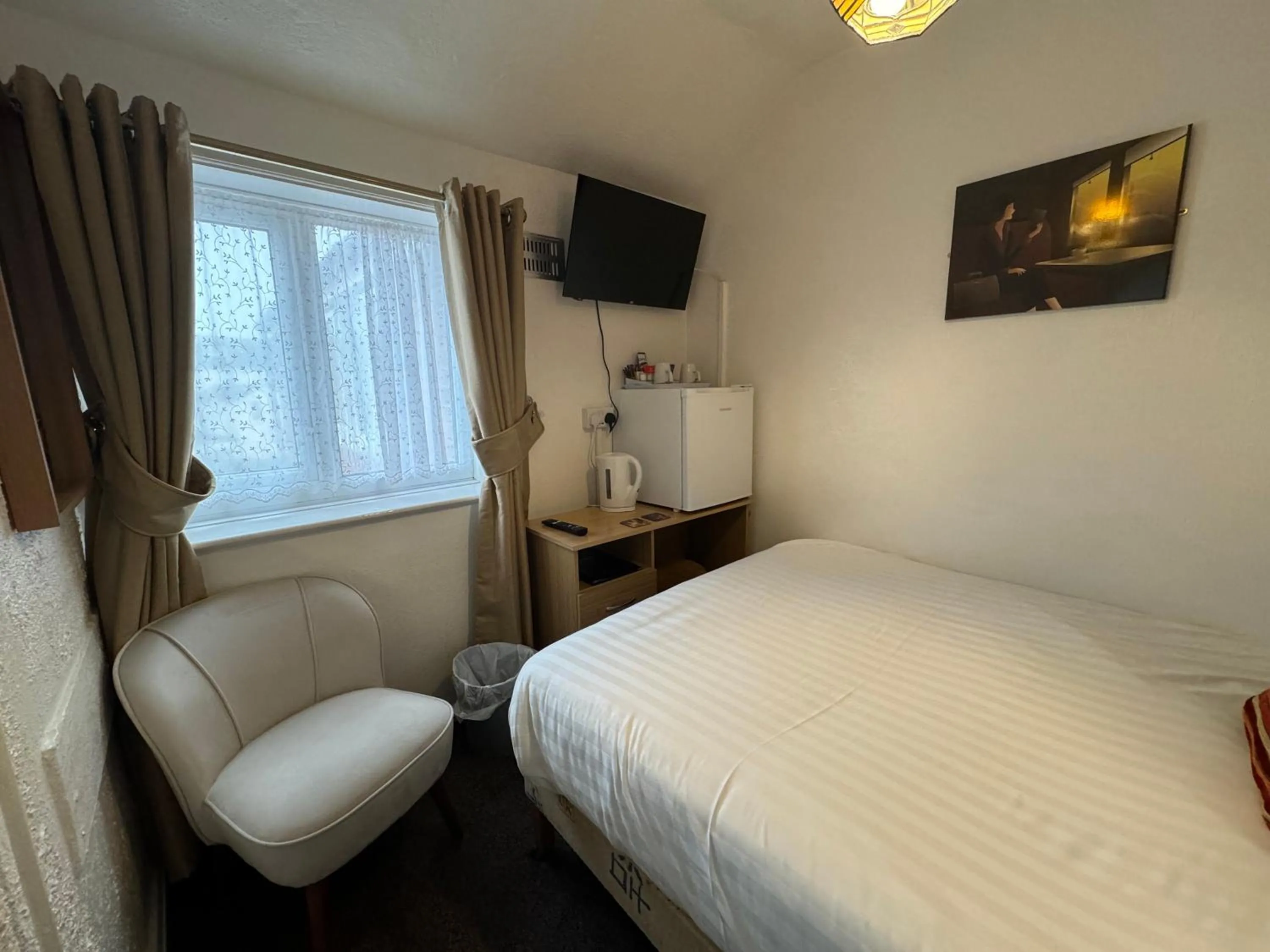 Photo of the whole room, Bed in The Scala Hotel