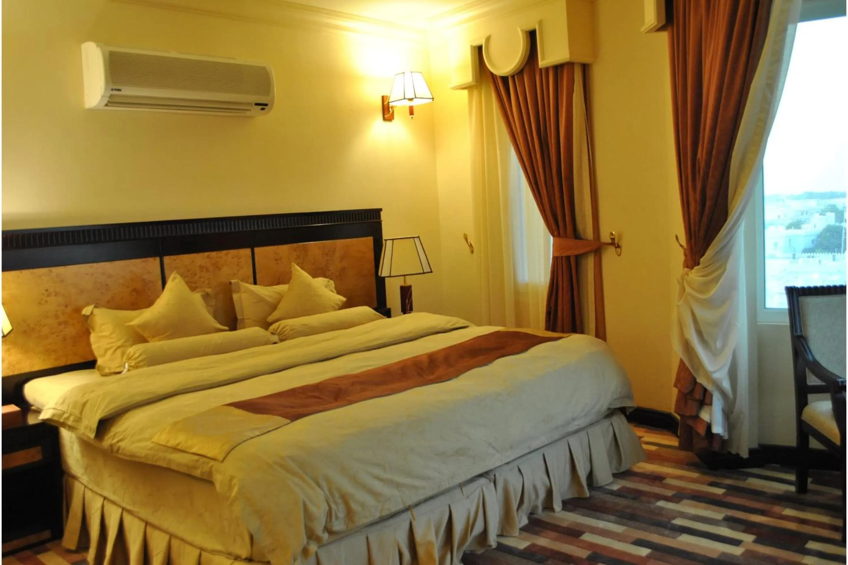 Bedroom, Bed in Capital O 155 Dmas Hotel