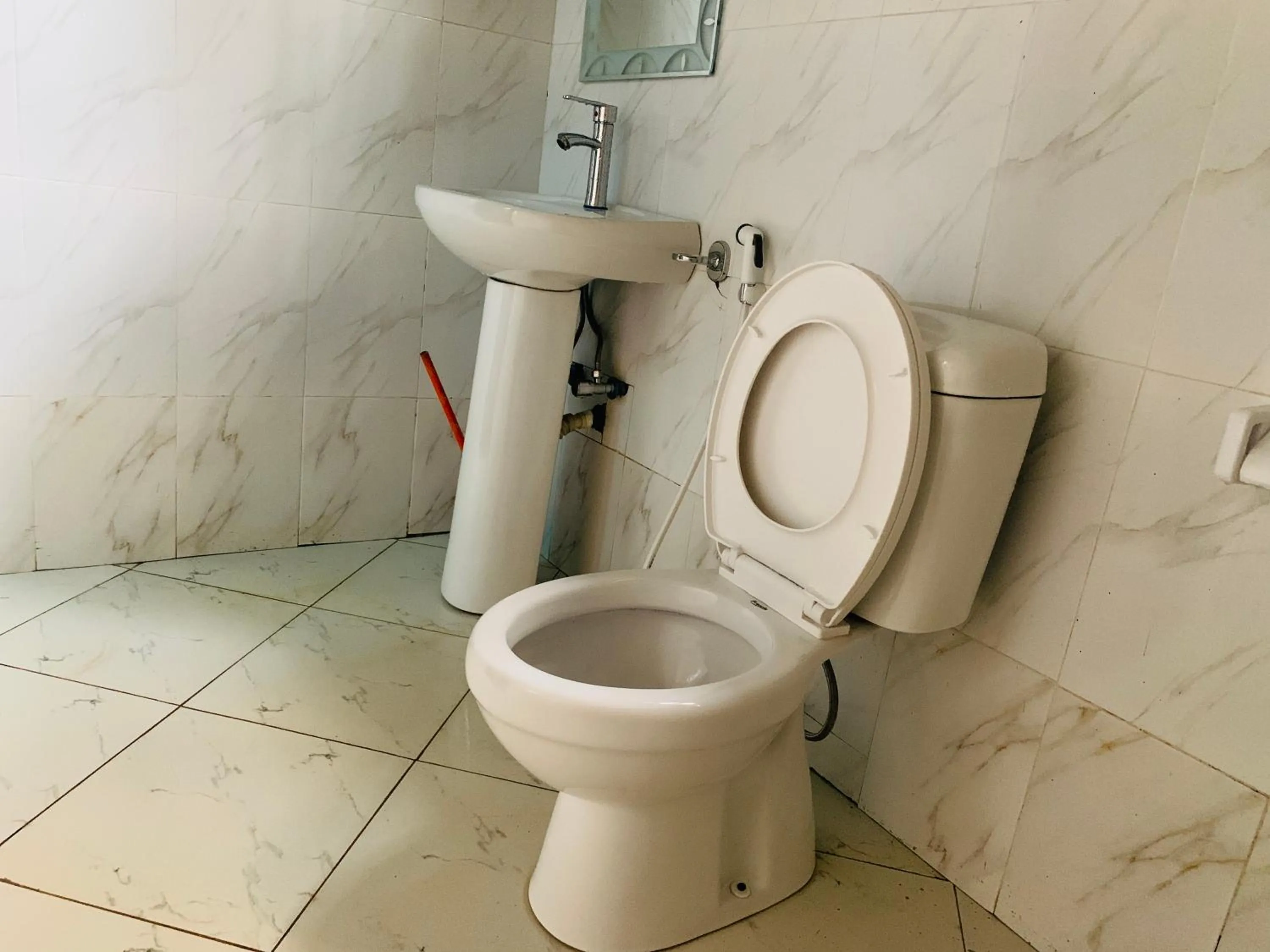 Toilet in Kilibase Hotel