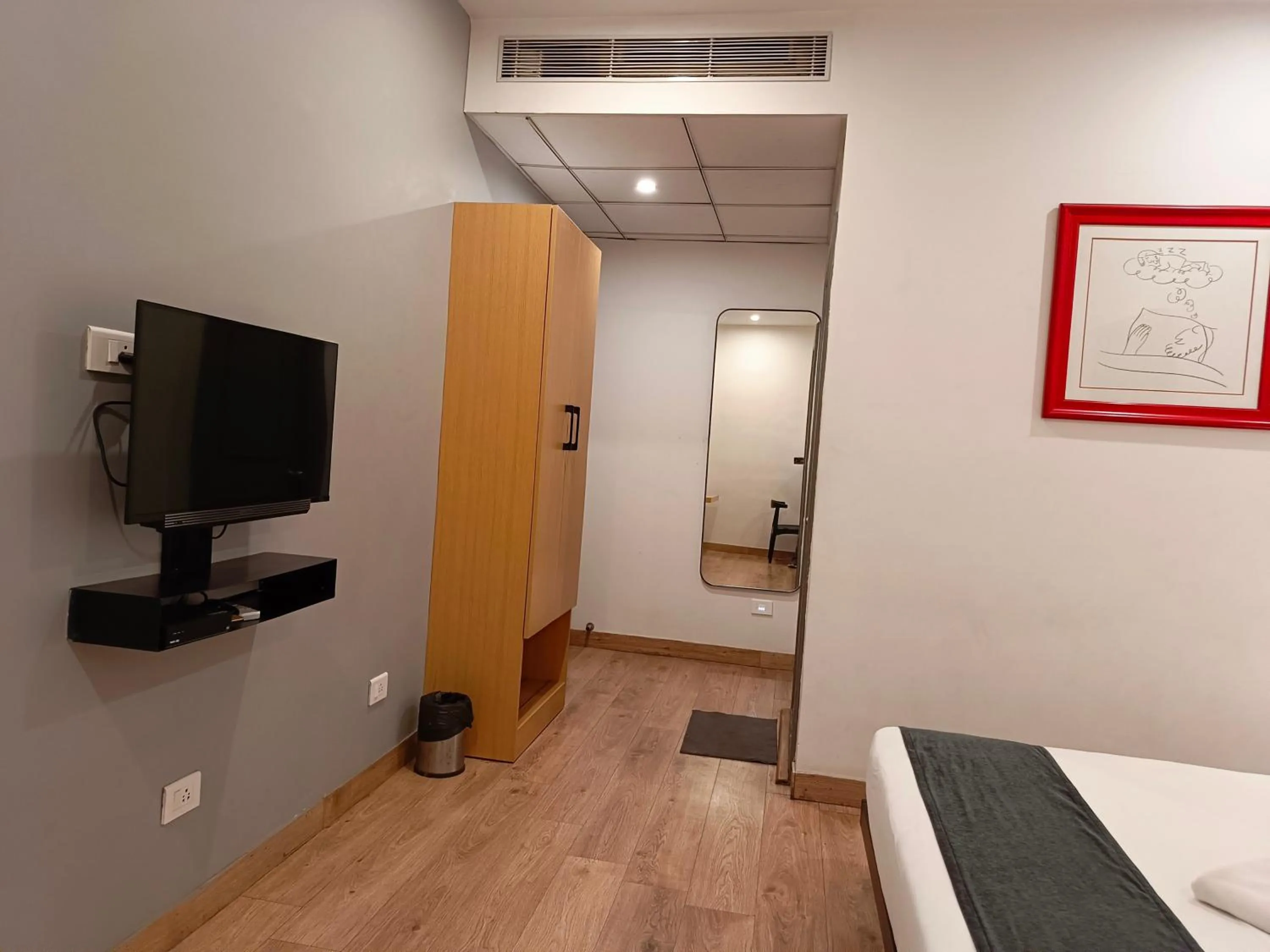 Bed in SM Hives Business Hotel