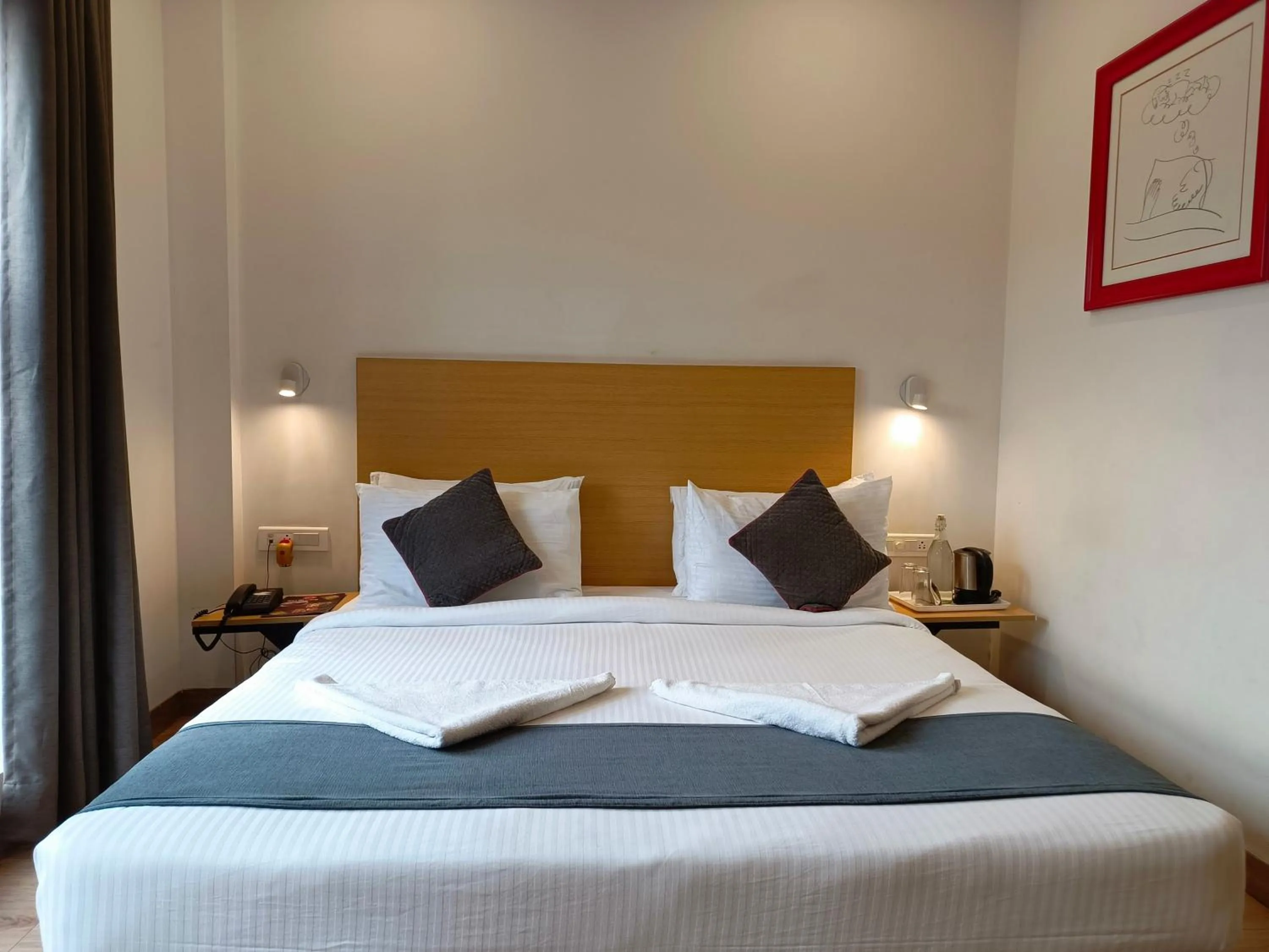 Bed in SM Hives Business Hotel