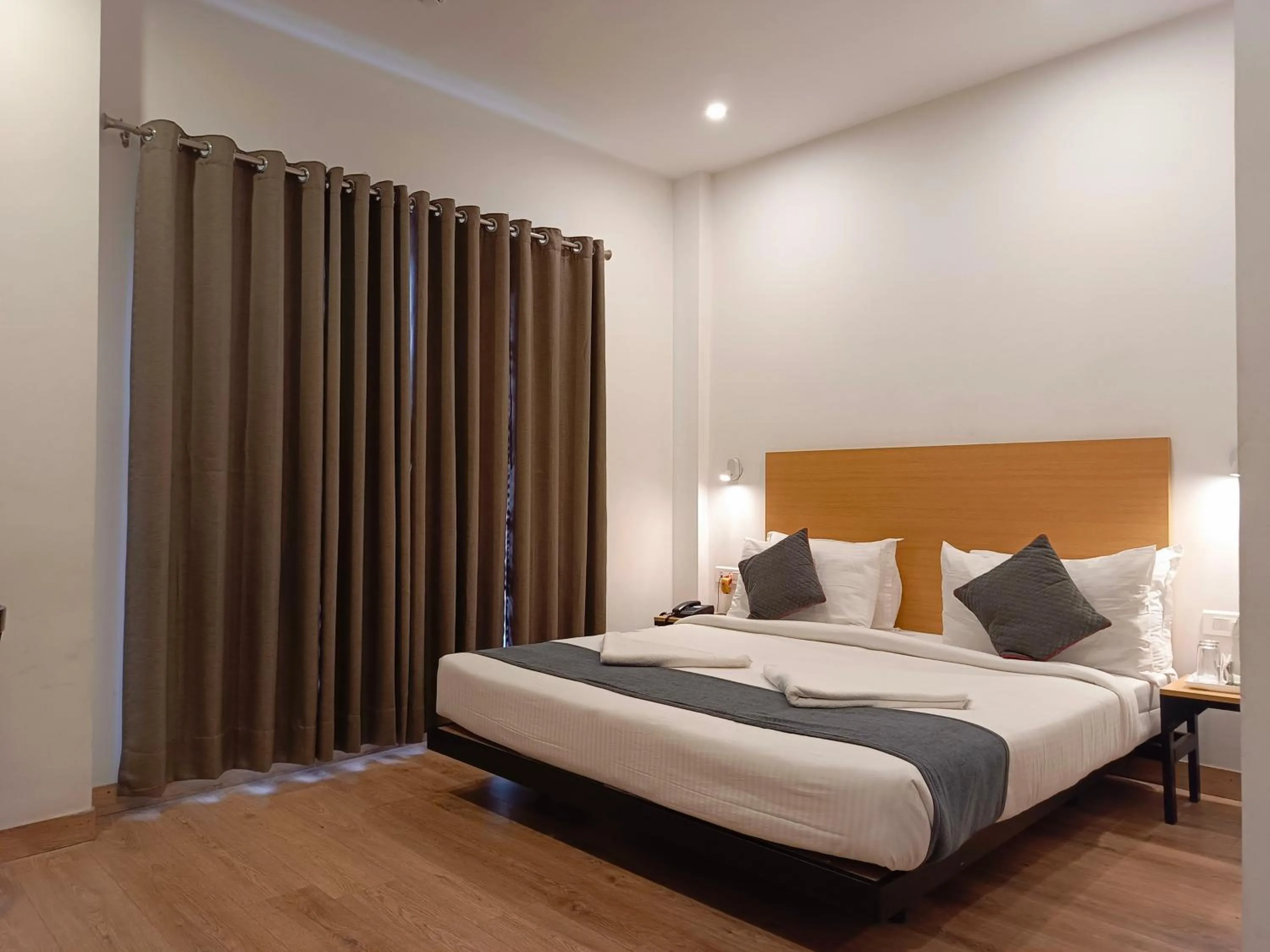 Bed in SM Hives Business Hotel