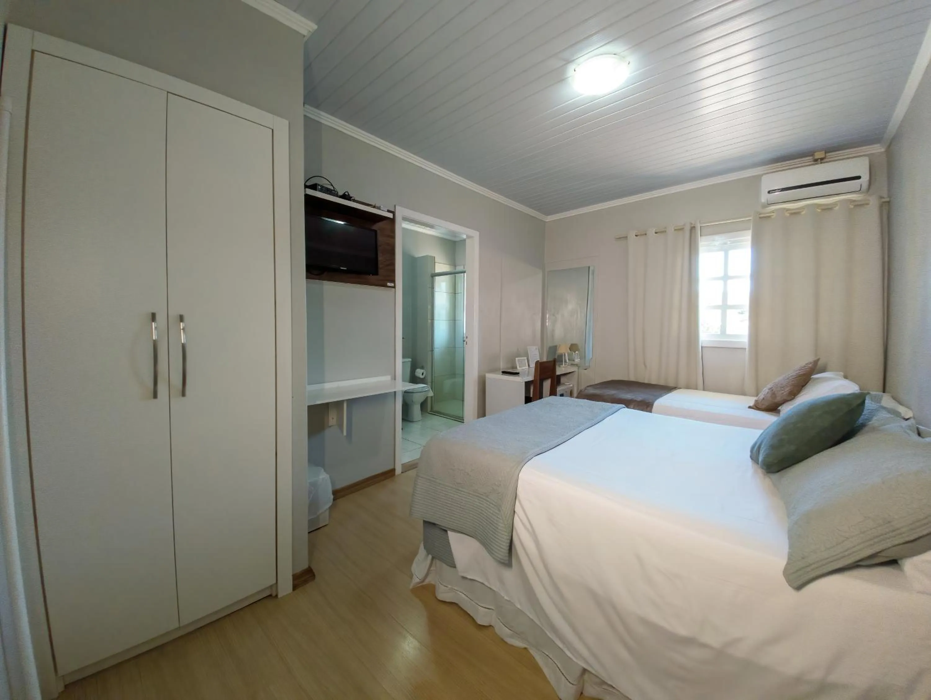 TV and multimedia, Bed in Pousada Boschetti