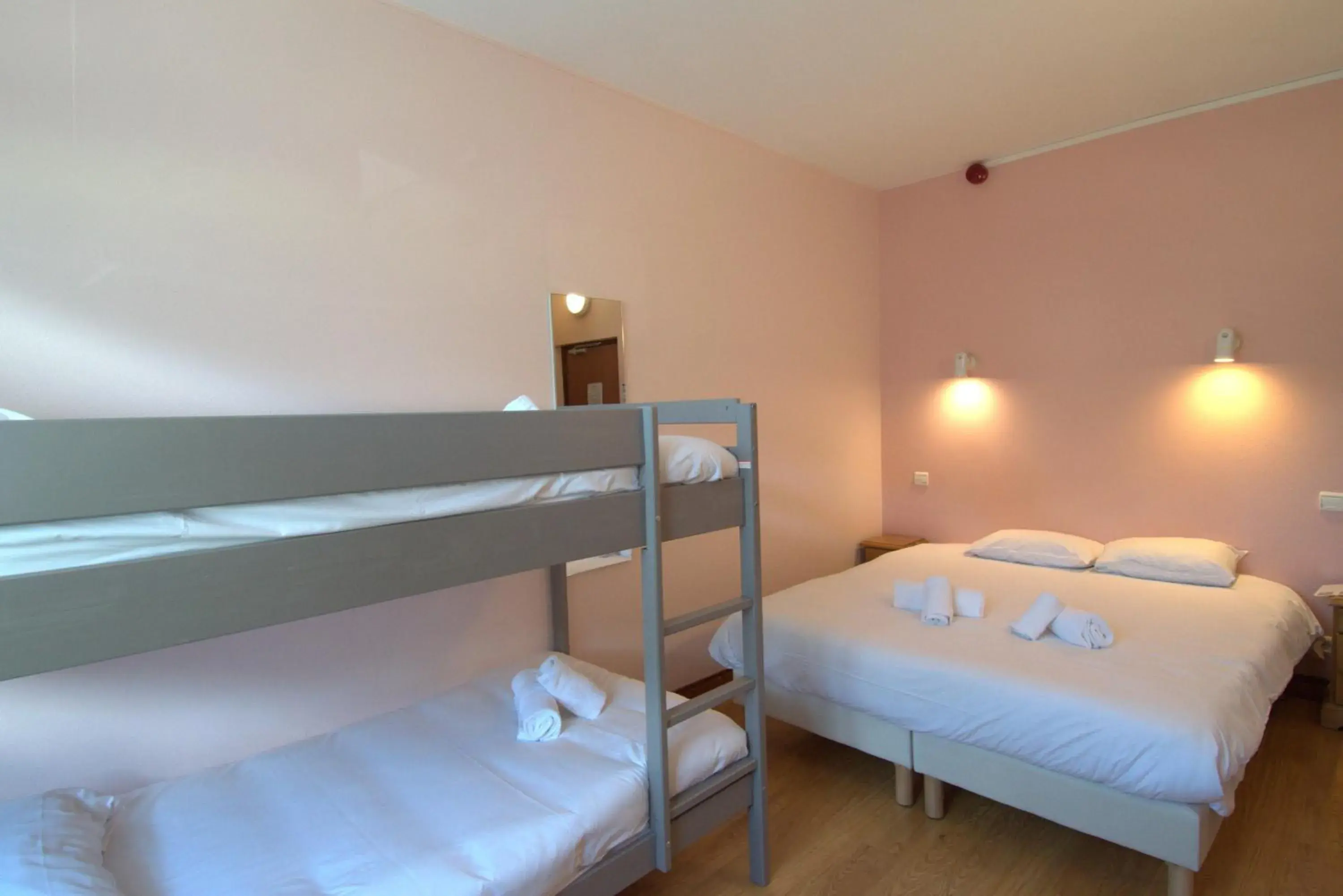 Photo of the whole room, Bed in Hôtel Le MontBlanc Photo of the whole room, Bed in Hôtel Le MontBlanc