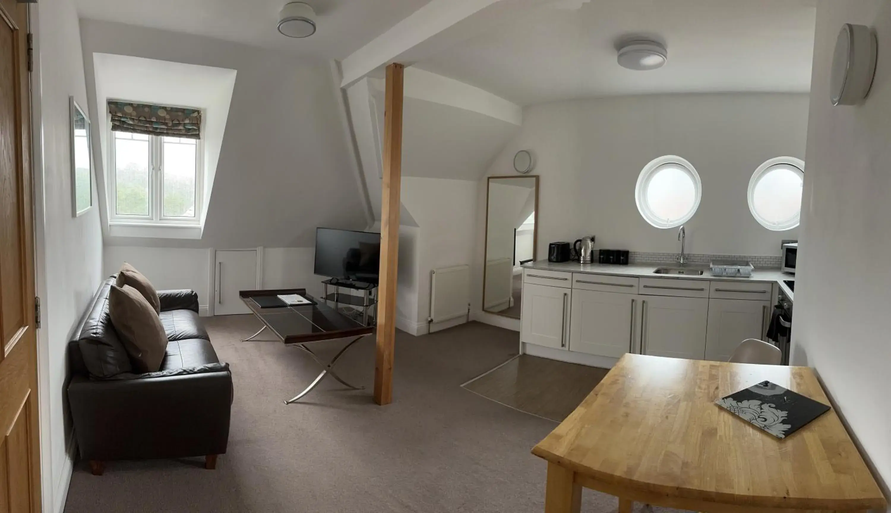 Living room, Kitchen/Kitchenette in Alum Chine Beach House