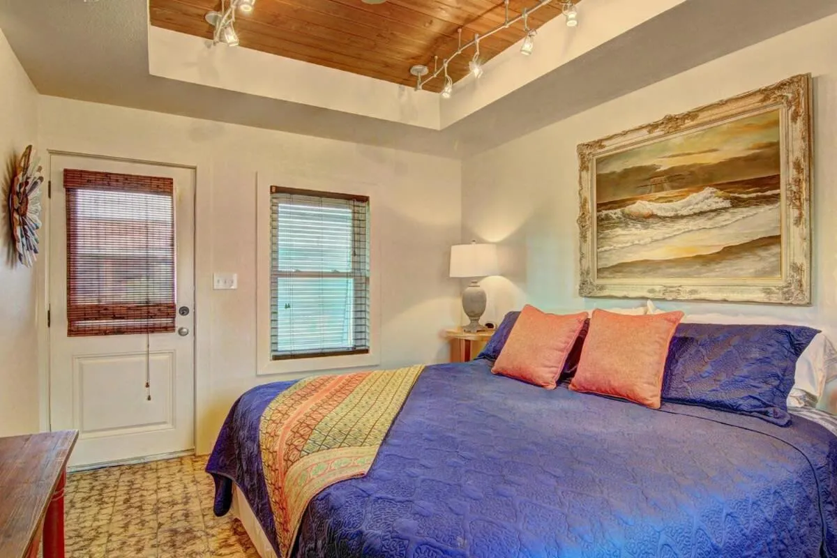 Bed in Lorna Beach Cottage at Spanish Village